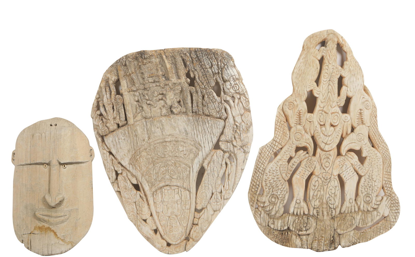THREE PRIMITIVE CARVED WOOD PLAQUES (1 of 15)