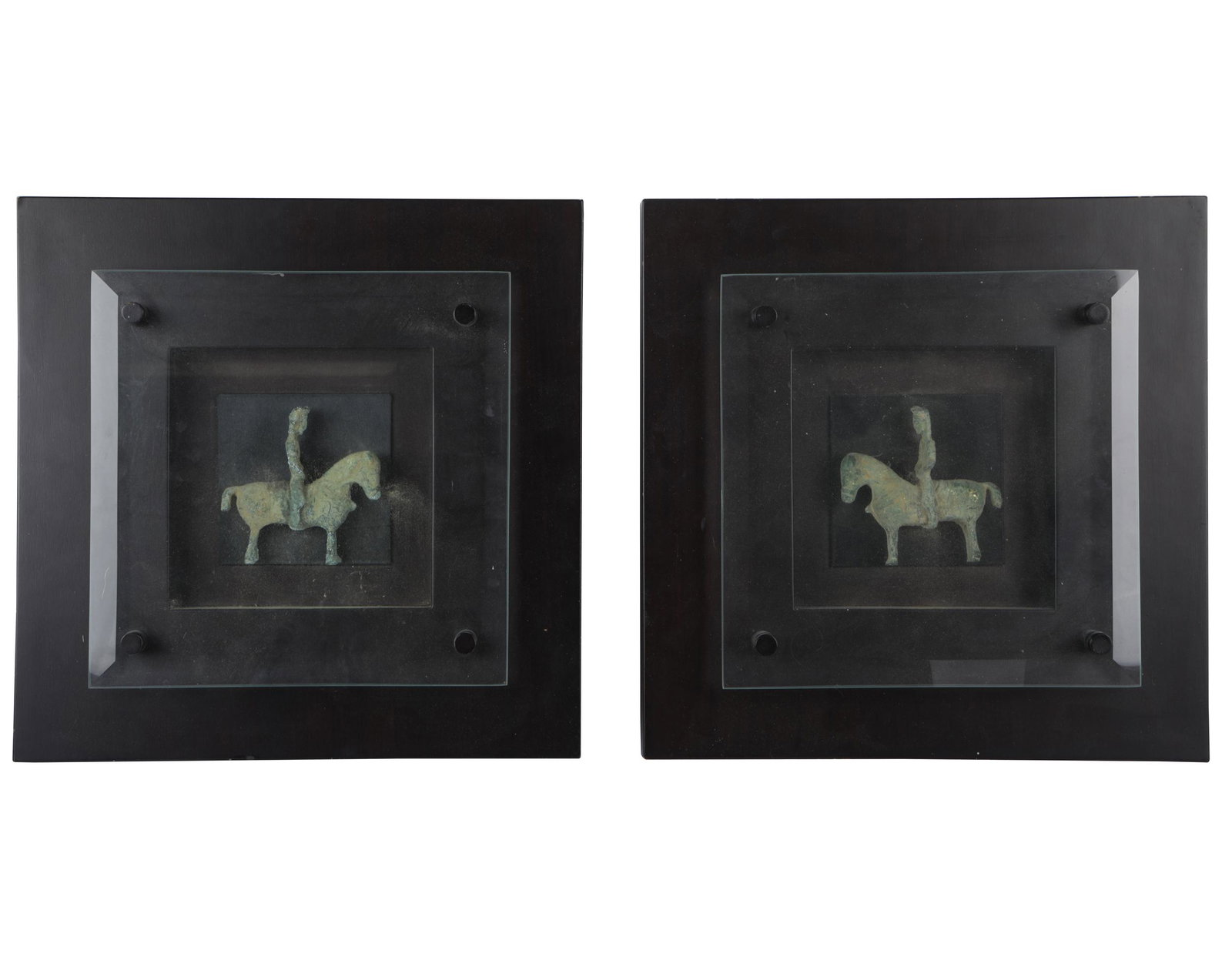 PAIR OF HAN DYNASTY-STYLE BRONZE FIGURES: mounted and framed under glass; each 4 inches wide; 15 1/2 x 15 1/2 inches frame