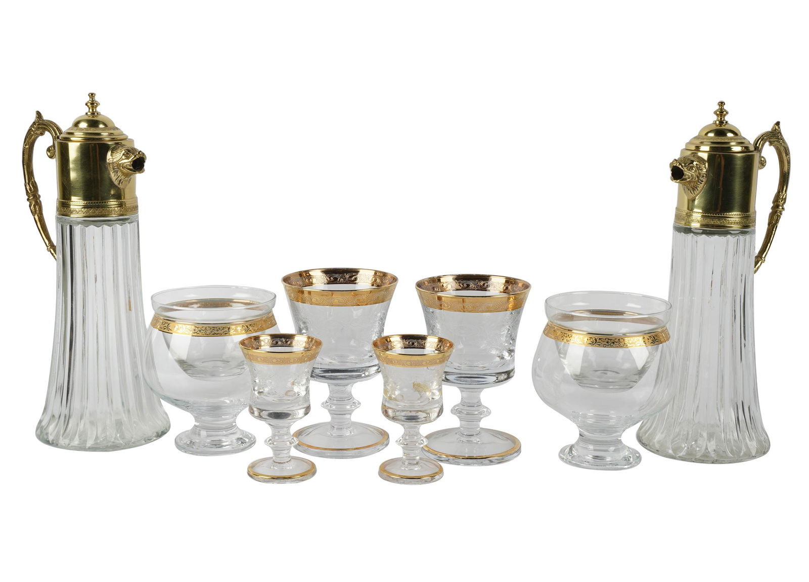 ETCHED & GILT GLASS SERVICE: unsigned; comprising 16 footed bowls with removable glasss liners (4" dia.); 11 goblets (5 1/2" high); 10 goblets (4 3/4" high); 12 goblets (4" high); and 2 carafes (11 1/4" high)