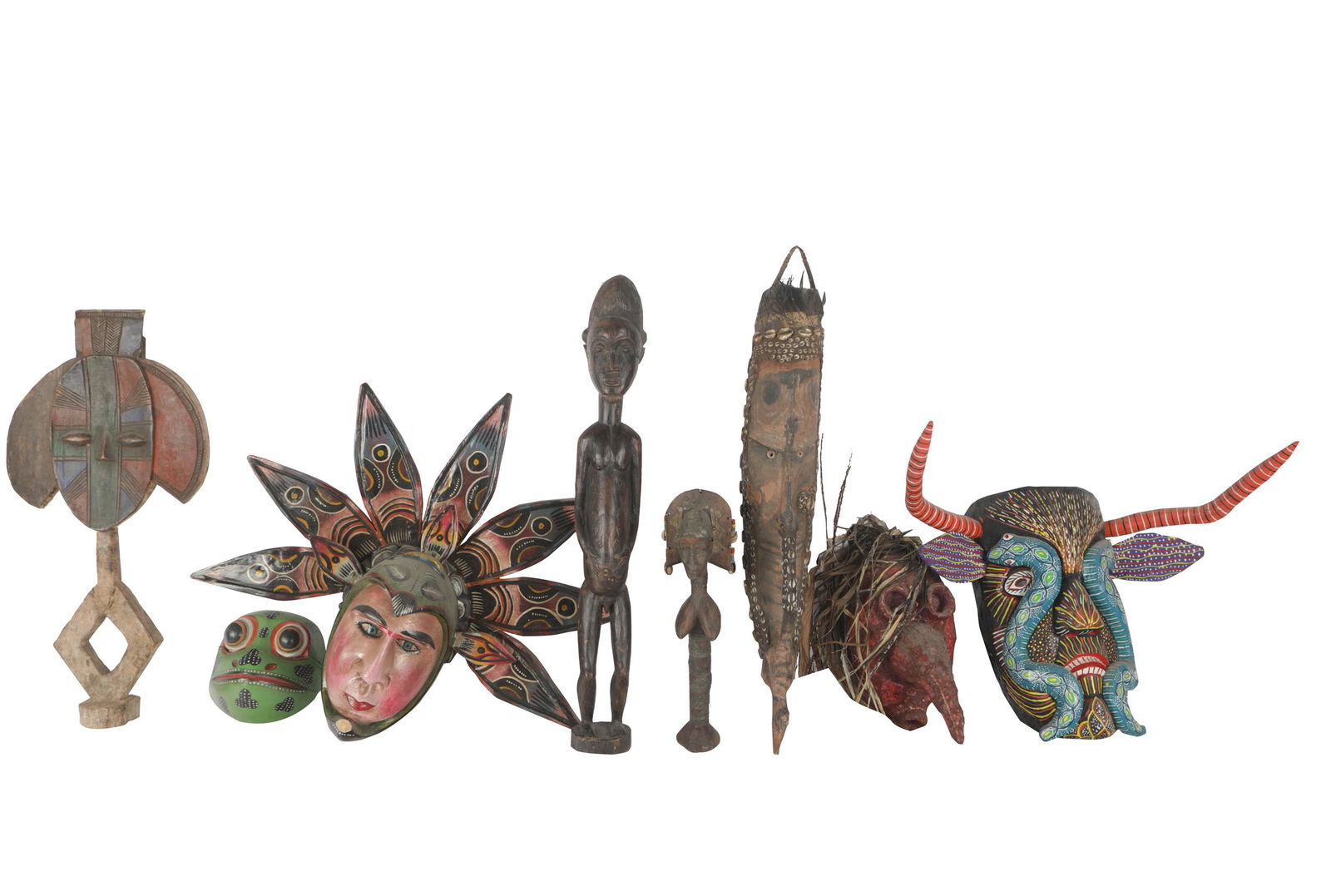 GROUP OF PAINTED CARVED WOOD MASKS AND TOTEMS (1 of 11)