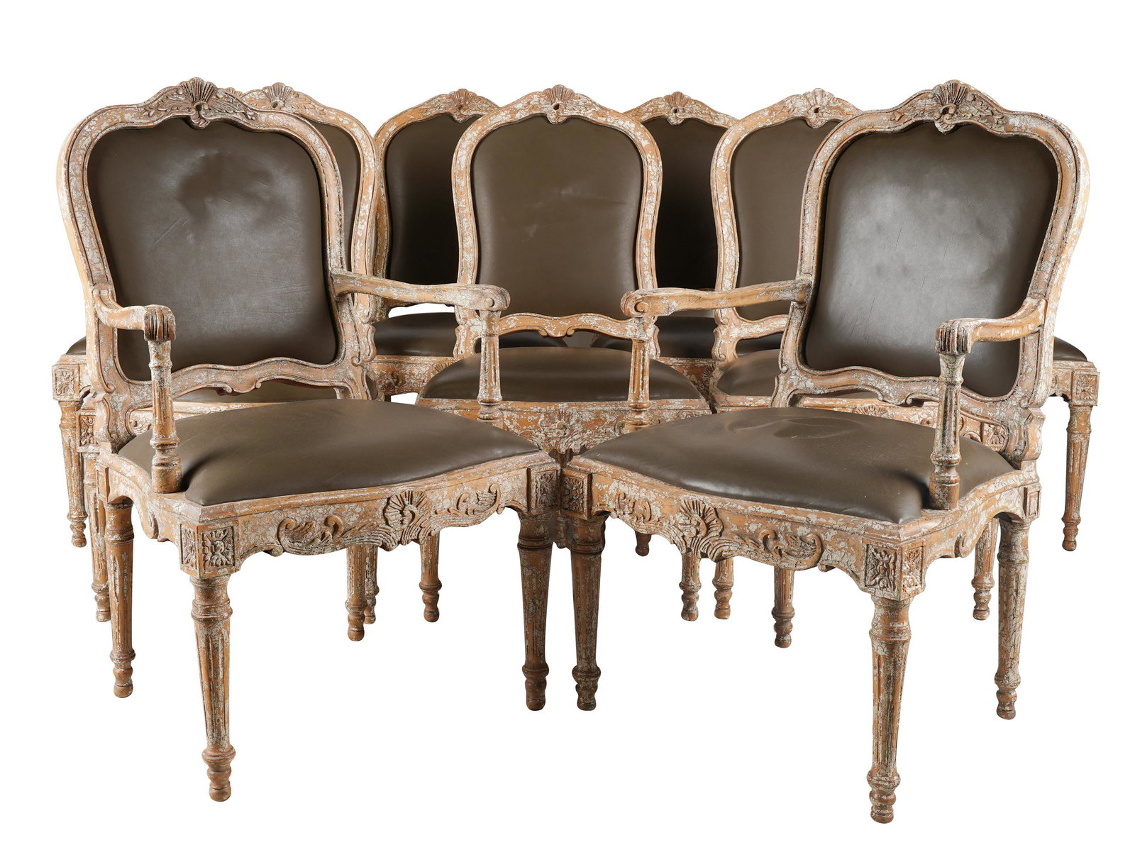 SET OF TEN ROCOCO-STYLEPAINTED WOOD DINING CHAIRS: comprising two armchairs (23 inches wide; 19 inches deep; 39 inches high; seat height: 17 inches; arm height: 26 1/4 inches) and eight side chairs (21 1/2 inches wide); each civered with brown leather