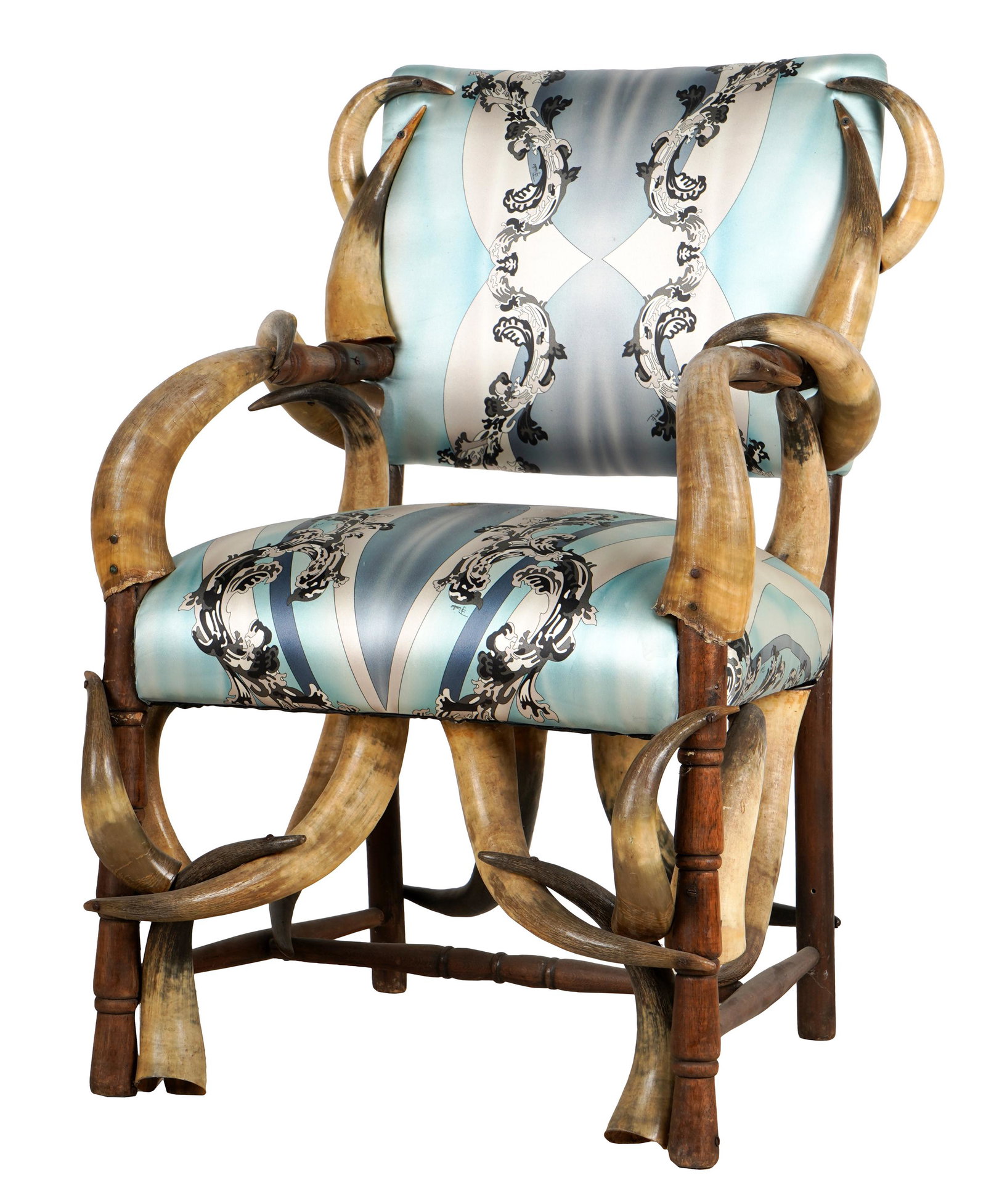 FABRIC-UPHOLSTERED HORN ARMCHAIR: unsigned; Condition: silk upholstery stained; 24 inches wide; 20 inches deep; 35 1/2 inches high; seat height: 20 inches high;