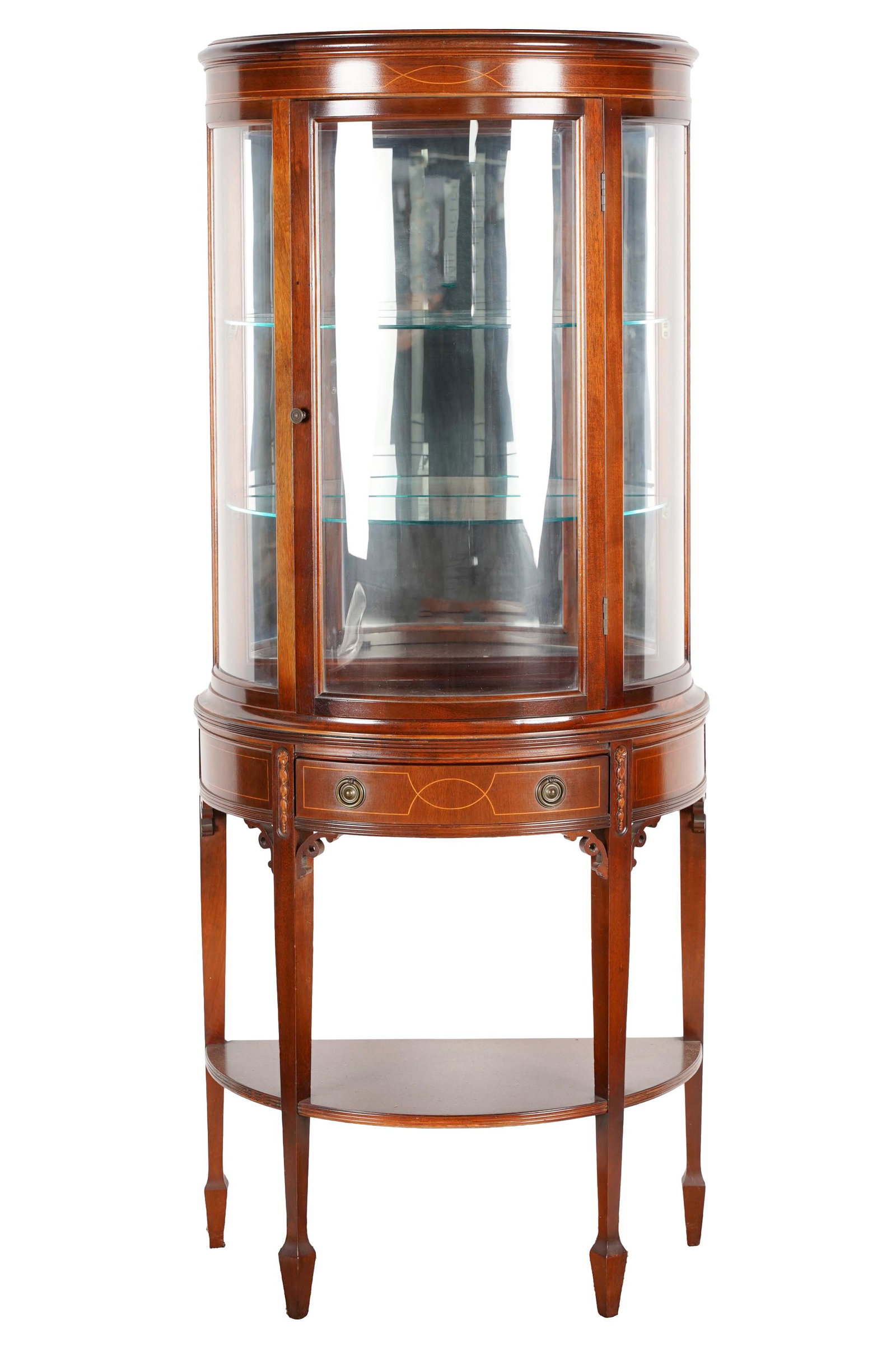 MAHOGANY DEMILUNE VITRINE CABINET: 20th century; unsigned; 24 inches wide; 13 1/2 inches deep; 60 inches high;