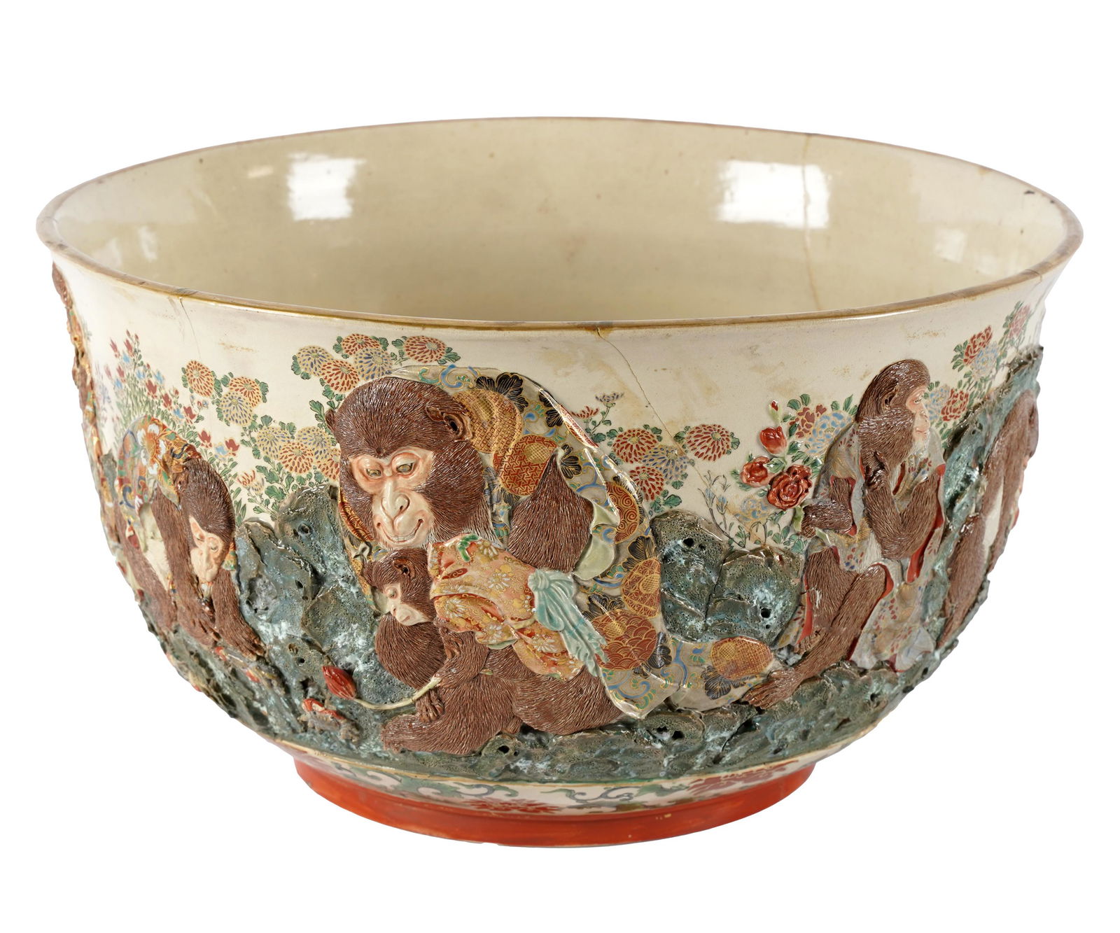 SATSUMA PORCELAIN BOWL: marked to underside; the exterior relief decorated with monkeys; Provenance: The Mrs. Stuart Davis Collection, Beverly Hills, CA; Condition: with repairs; 14 1/2 inches diameter; 8 1/4 inches high