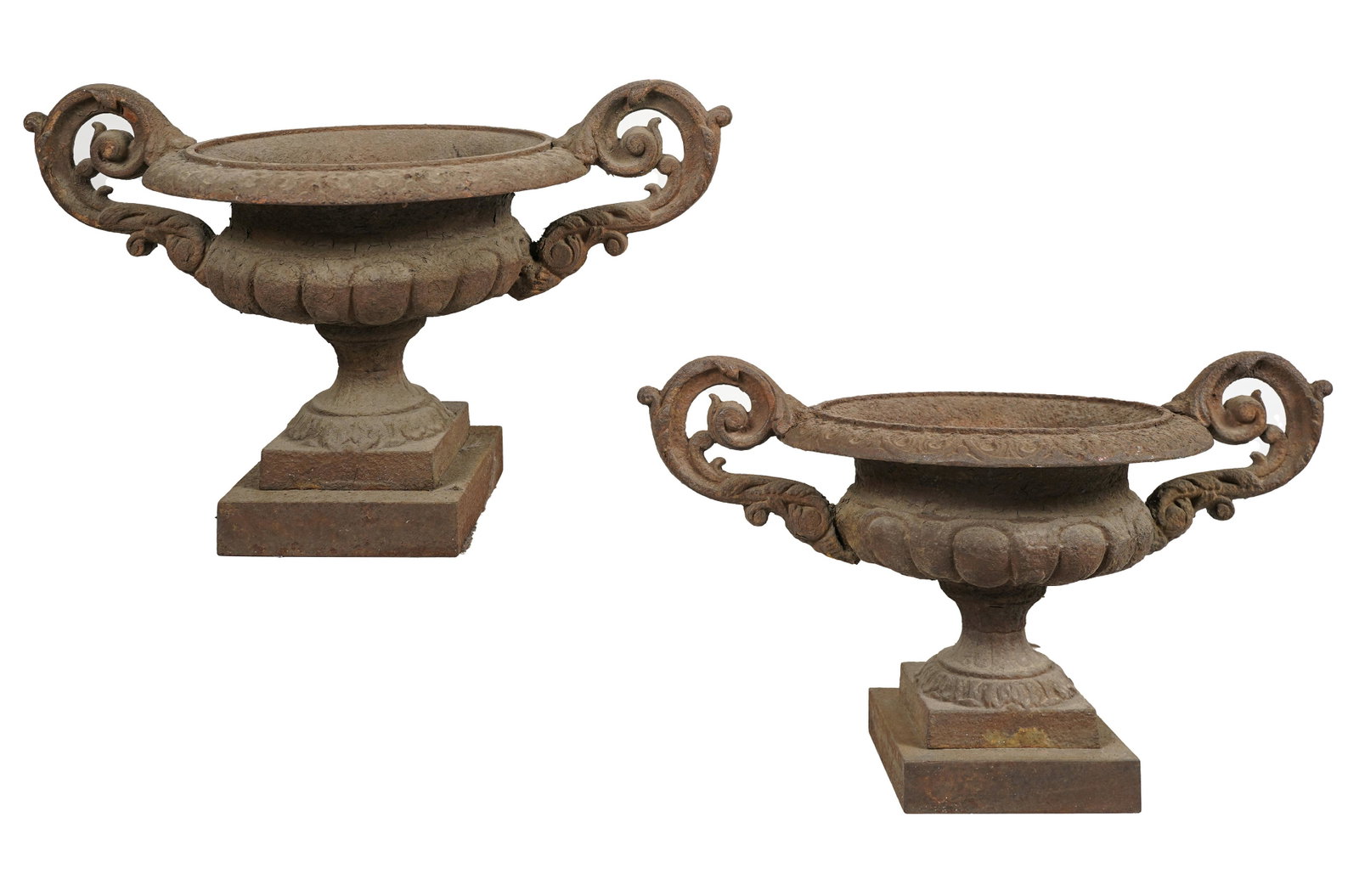 PAIR OF NEOCLASSICAL CAST IRON JARDINIERES: Condition: each with heavy oxidation; 19 1/2 inches wide; 11 3/4 inches deep; 11 1/2 inches high