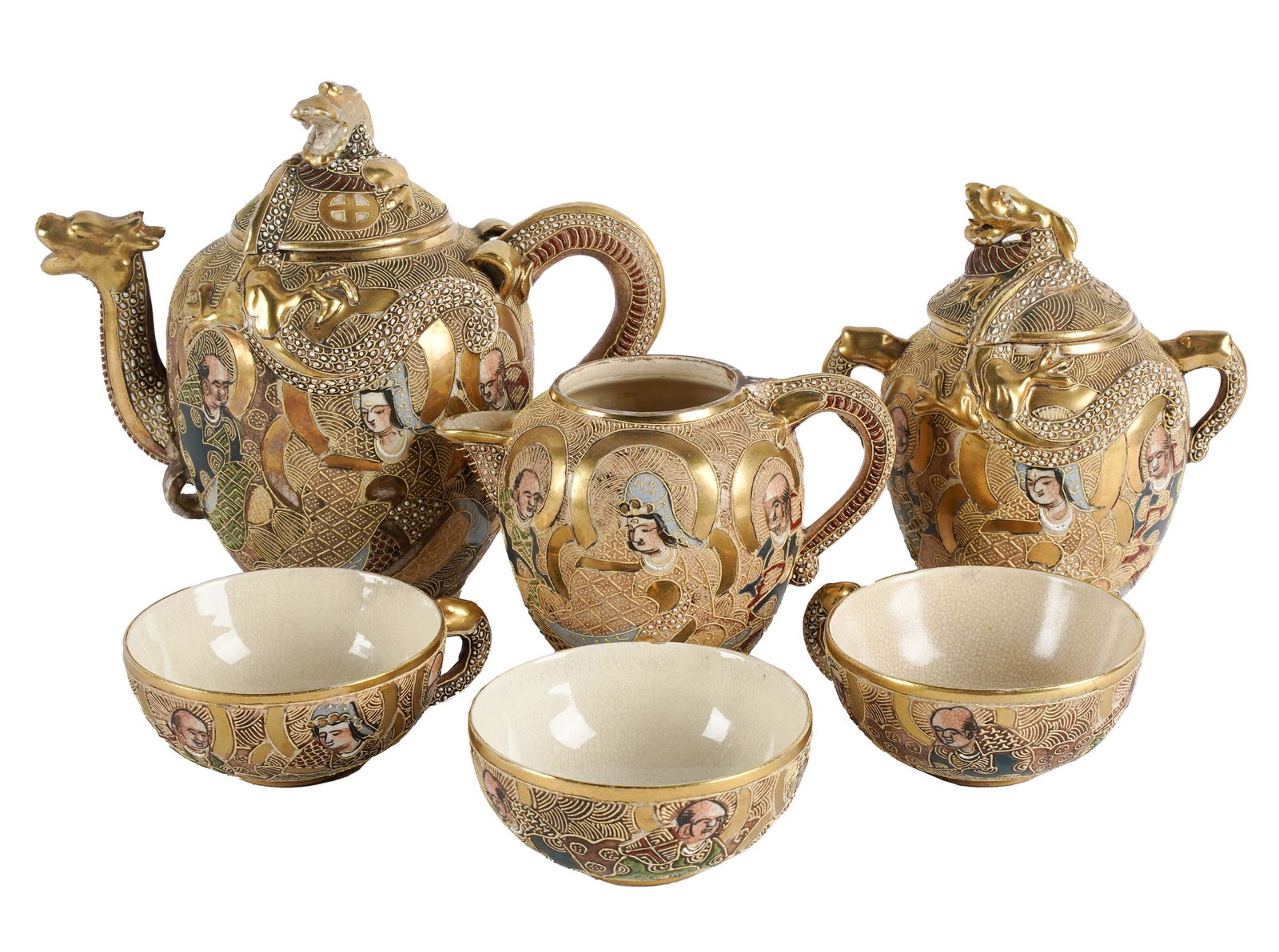 SATSUMA PORCELAIN TEA SERVICE: gilt two-character mark; comprising a teapot (7 inches high), a sugar (5 3/4 inches high), a creamer (3 3/4 inches high), and four tea cups; Provenance: The Mrs. Stuart Davis Collection, Beverly Hills