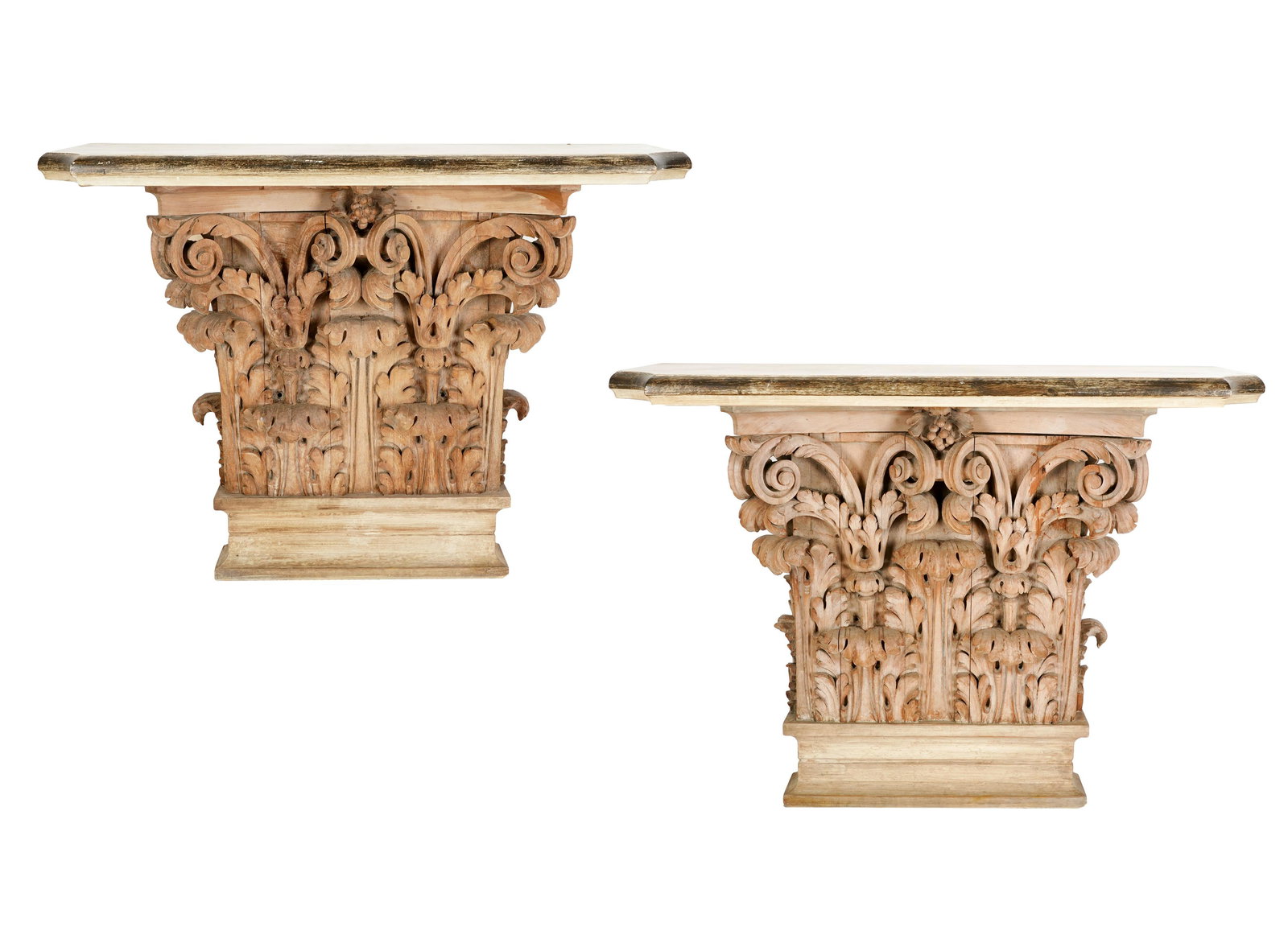 PAIR OF CARVED WOOD CONSOLE TABLES: each with shaped painted wood top on a base carved as a Corinthian capital; Condition: requires wall mounting; 42 inches wide; 16 inches deep; 32 inches high