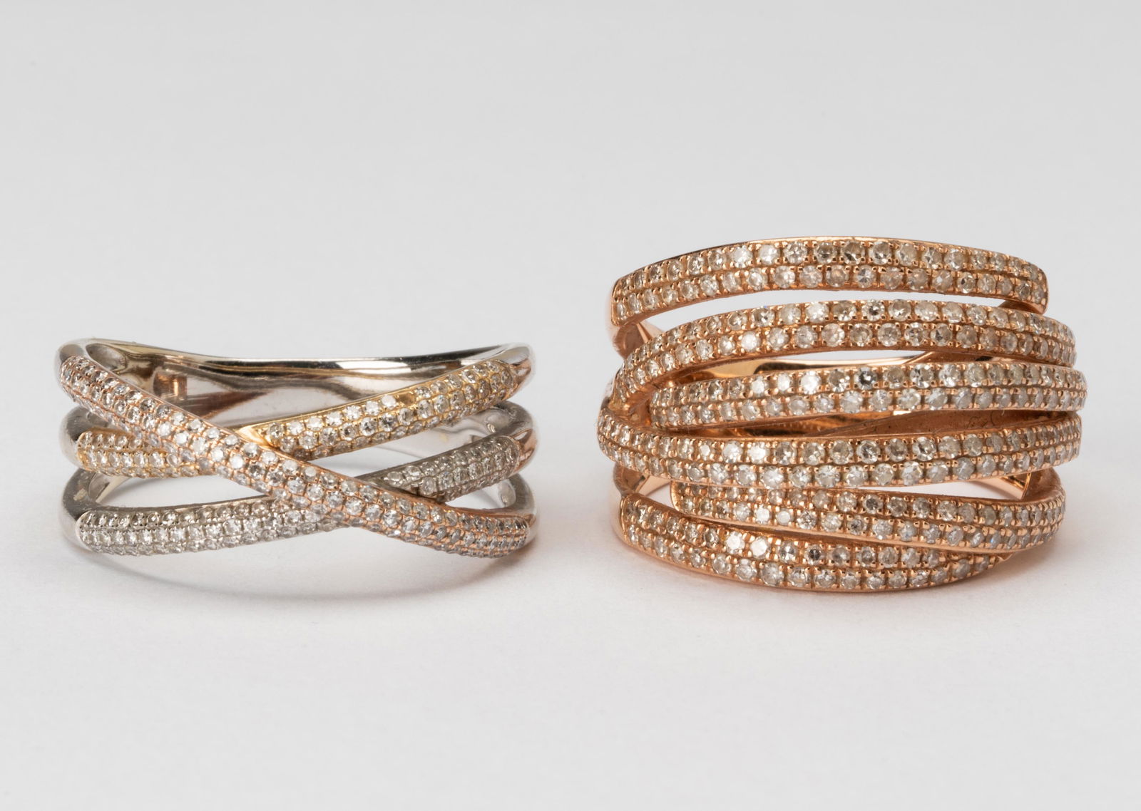 TWO 14 KARAT GOLD AND DIAMOND BAND RINGS (1 of 5)