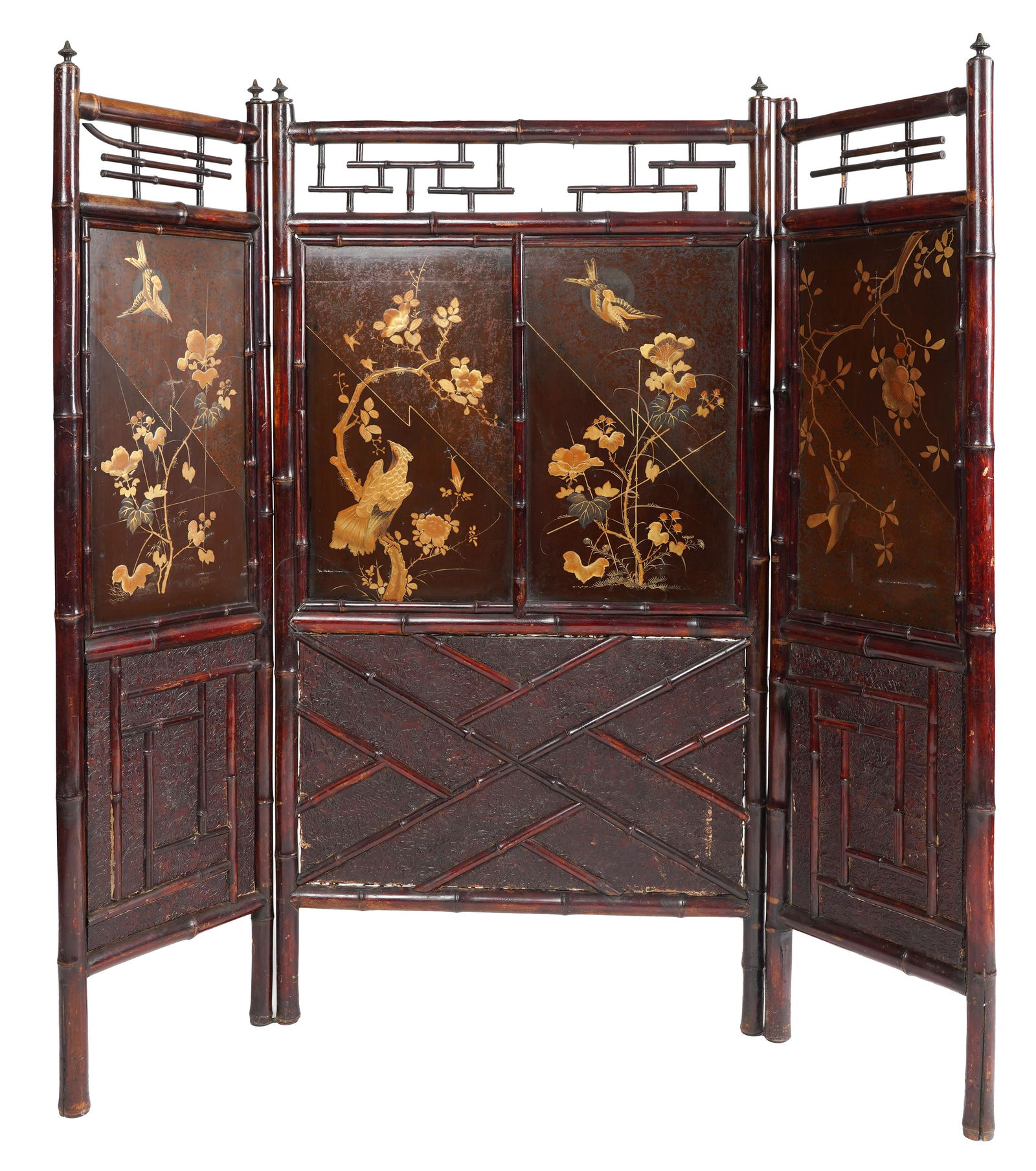 AESTHETIC MOVEMENT THREE- PANEL FLOOR SCREEN: late 19th century; lacquered bamboo, Japanese lacquer, and embossed leather; Provenance: Michael Davis Antiques (paper label attached); Condition: scattered losses to leather; cracks to lacquer; wobbl