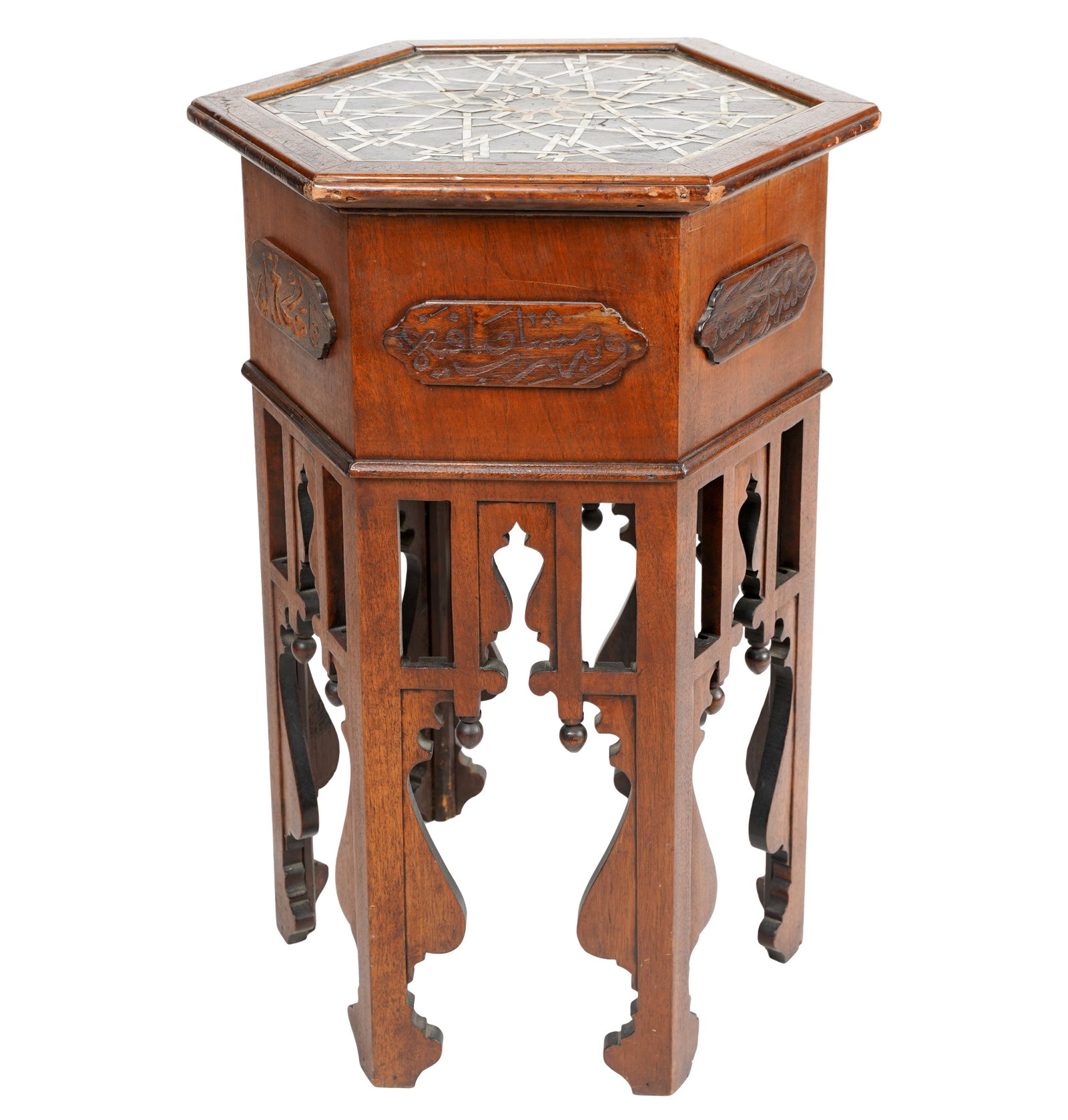 SYRIAN SHELL-INLAID TABORET: hexagonal; each side with a raised panel inscribed with calligraphy; Provenance: The E.T. and Wife Collection, Long Beach, California; 19 inches diameter; 26 inches high