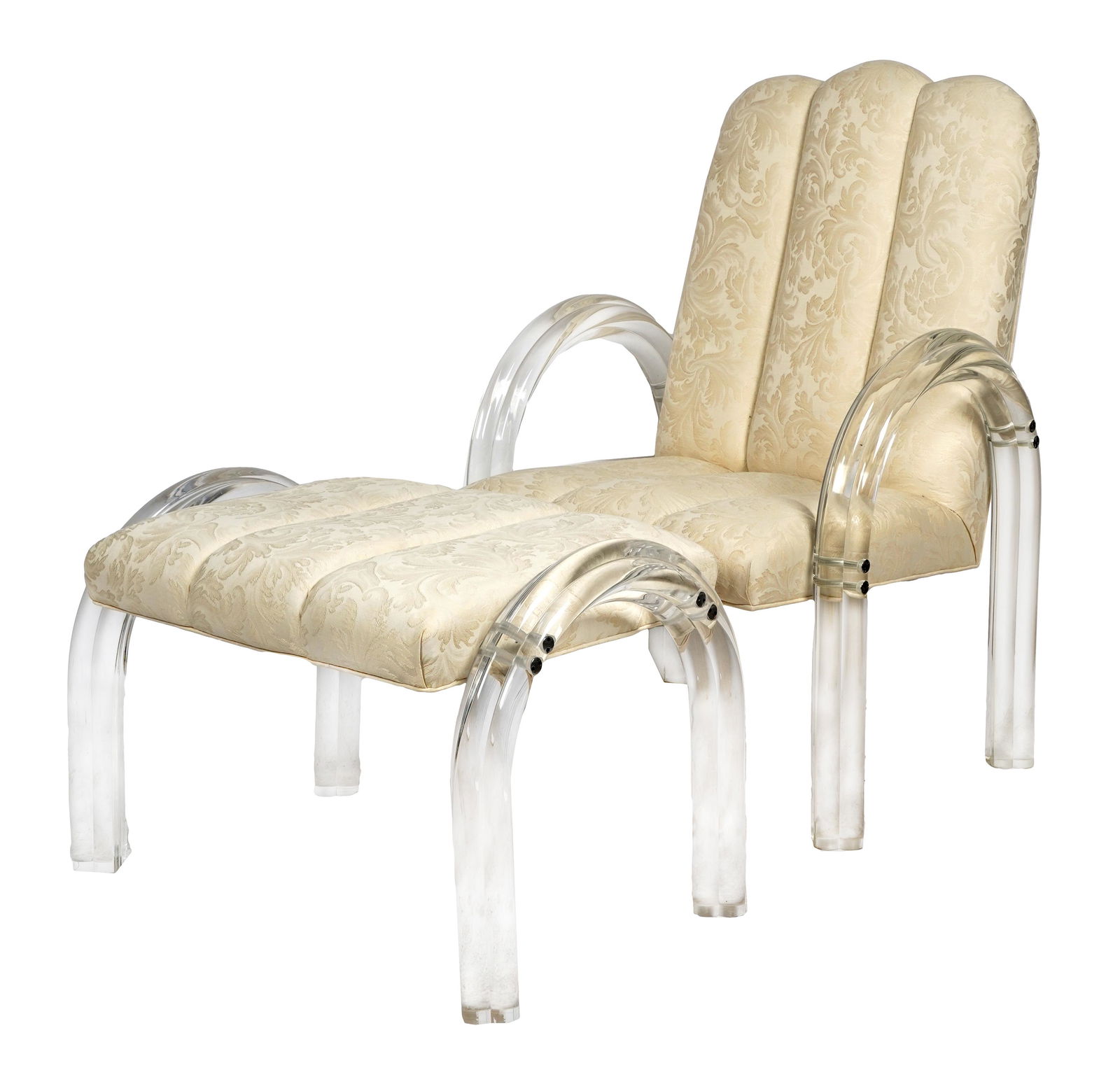 LUCITE ARMCHAIR & OTTOMAN: covered with cream-colored damask fabric; the armchair 27 inches wide; 25 inches deep; 39 inches high; seat height: 17 inches; the ottoman 29 inches wide; 19 inches deep; 19 inches high