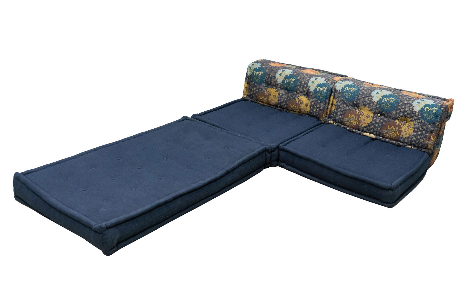 HANS HOPFER / ROCHE BOBOIS "MAH JONG" SOFA: with manufacturer's labels; covered with Kenzo fabric; comprising two side sections (39 inches wide; 39 inches deep; 20 inches high; seat height: 8 inches) and an elongated flat cushion (64 inches wid