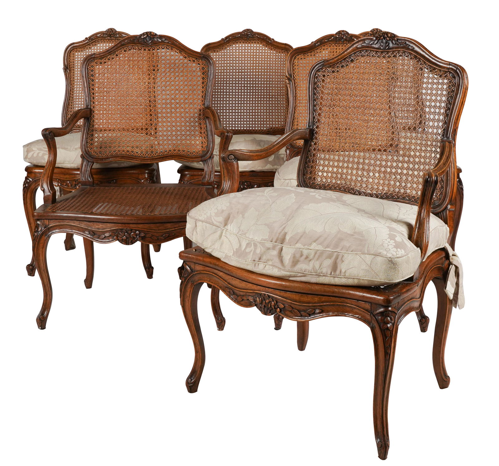 SET OF SIX ANTIQUE FRENCH PROVINCIAL CANED CHAIRS: comprising: two fauteuils (26 inches wide; 20 inches deep; 39 inches high; seat height: 16 inches) and four chaises (side chairs) (21 inches wide); all but one armchair with loose seat cushion; Condit
