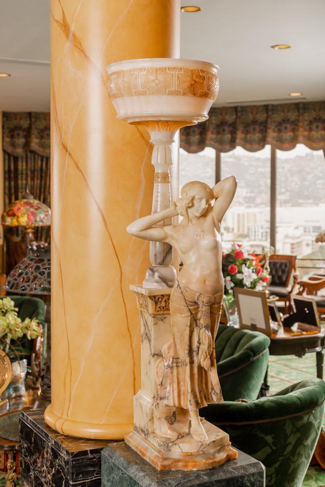 Larry Flynt Italian Florentine Carved Alabaster & Marble Figural Lamp: Larry Flynt Italian Florentine Carved Alabaster & Marble Figural Lamp signed to base; the Art Nouveau-style semi-nude female figure in exotic clothing (31 inches high); 45 1/2 x 12 x 12 in. (115.57 x