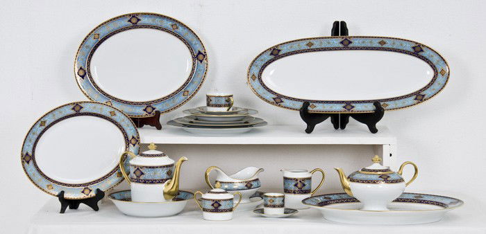 BERNARDAUD PORCELAIN DINNER SERVICE: Grace pattern; 133 pieces comprising of: eighteen dinner plates, eighteen salad plates, eighteen bread and butter plates, eighteen soup bowls, eighteen cups and eighteen saucers,eight demitasse cups a