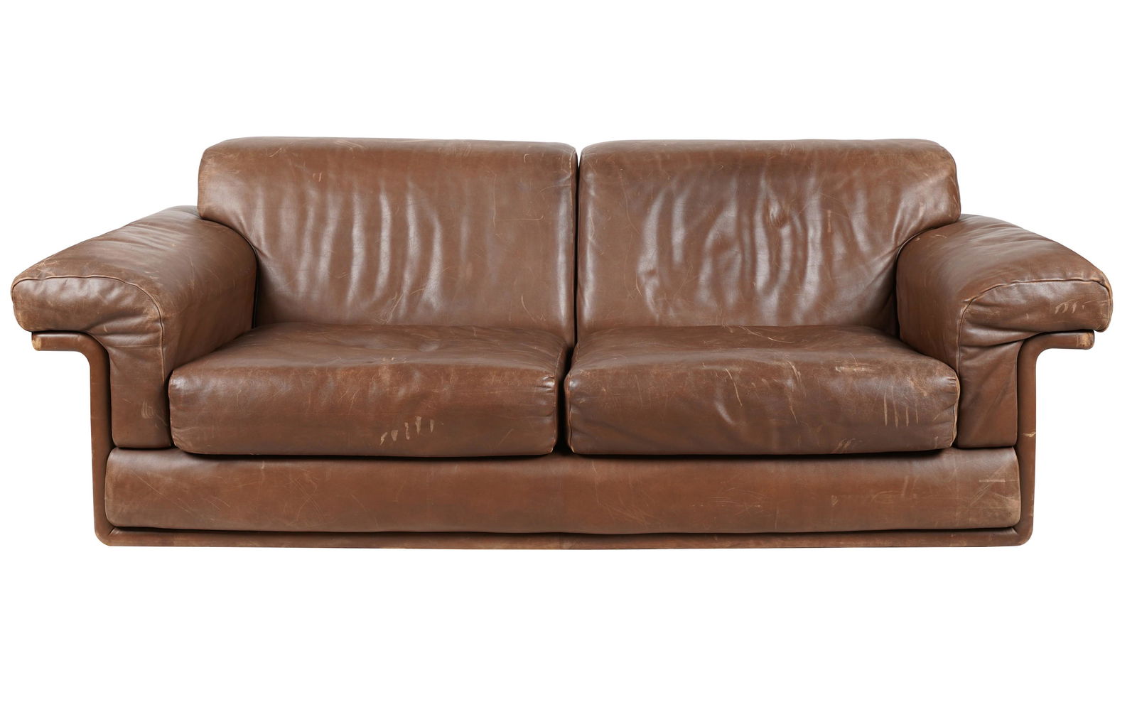 De Sede Brown Leather Sofa: with manufacturer's label 30 x 78 x 35 in. (76.2 x 198.1 x 88.9 cm.), seat height: 15 in. (38.1 cm.)