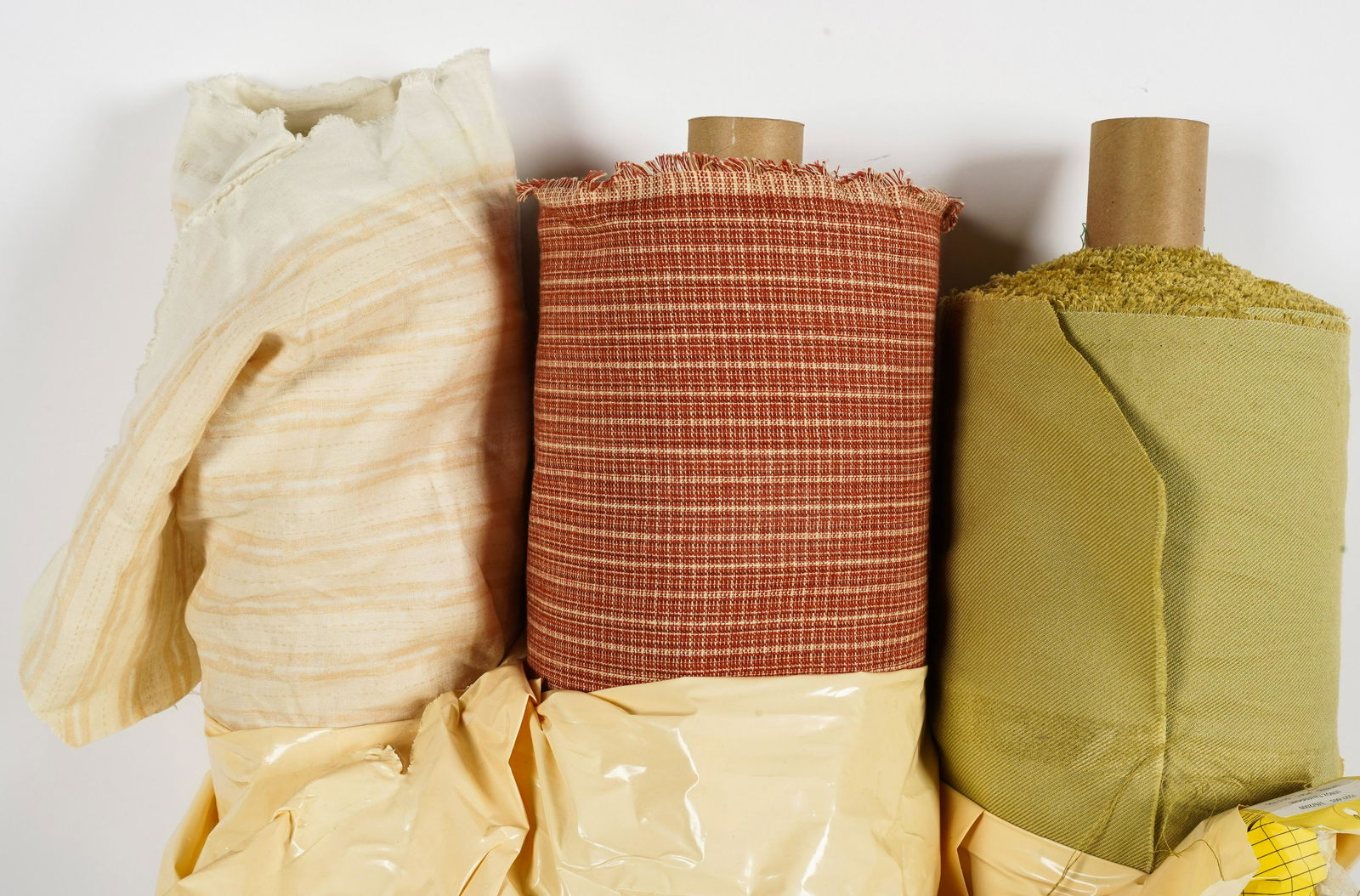 Three Bolts of Rose Tarlow Melrose House Fabric: comprising Little Ikat Tangerine 100 percent linen (55.5 yards), Greylock Paprika 100 percent linen (50 yards), and Lenox Twill Frog Belly (51.5 yards)