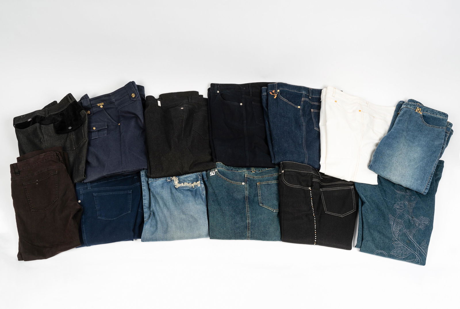 13 Pairs of Designer Denim Jeans: comprising four St. John Sport (size 10); three size 12, one St. John Sport, two Fabrizio Gianni; four size 42, one St. John Sport, three Escada; two size unknown, one St. John Sport, one Escada Sport