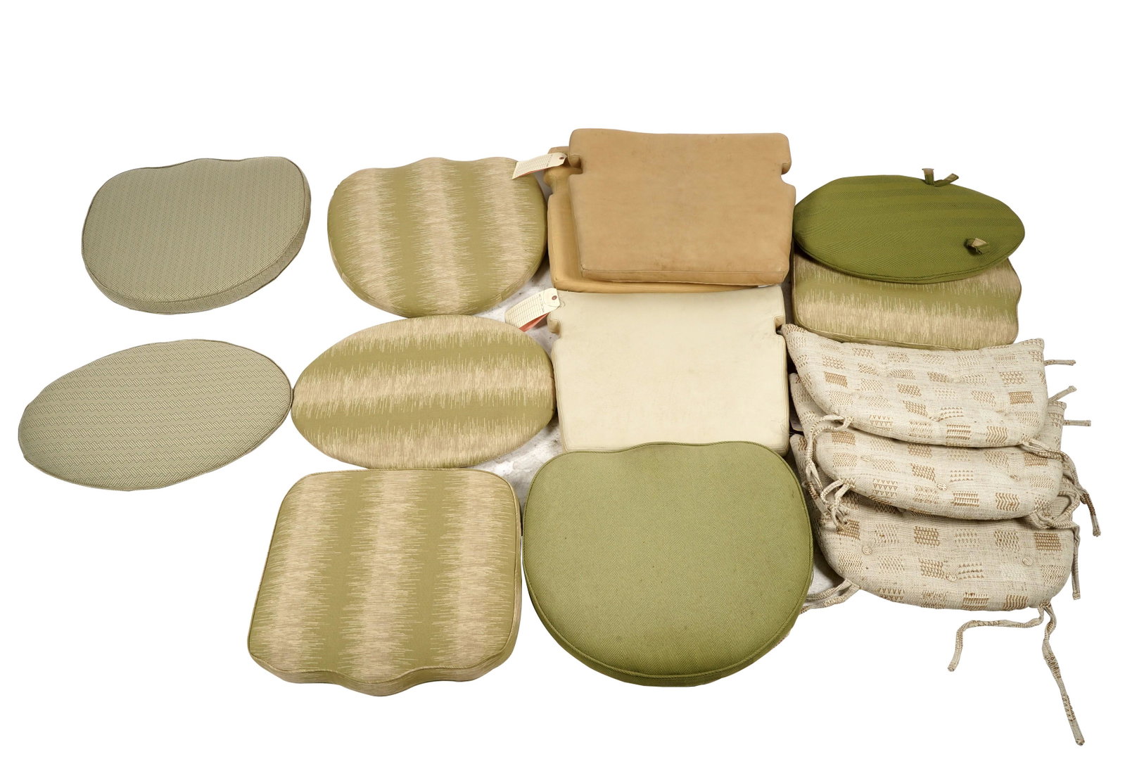 Group of Rose Tarlow Melrose House Patio Cushions: various shapes, sizes, colors and fabrics [14 pieces]; the three oval cushions each 18 x 25 in.