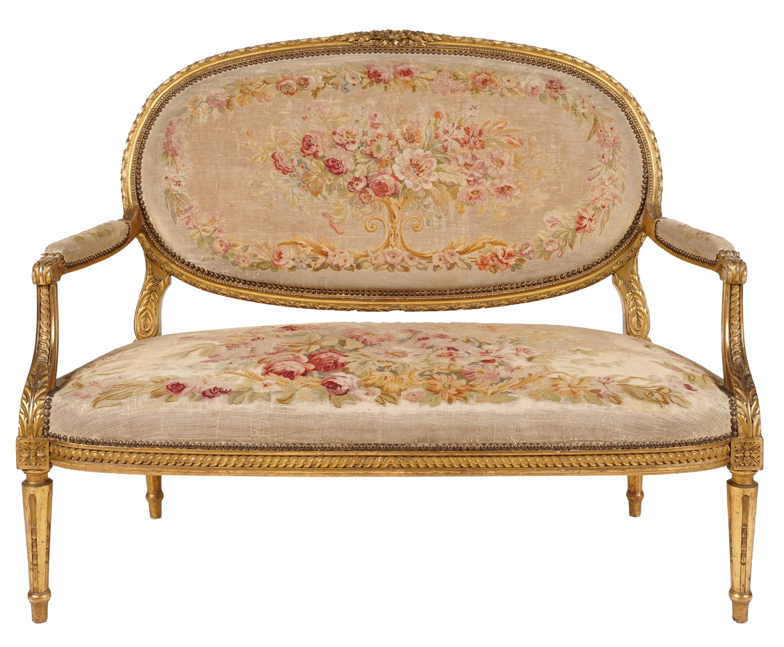 Antique Louis XVI-style Giltwood Canape: carved with foliage, floral and guilloche borders, and a bowknot cresting, covered with floral tapestry with nailhead trim 42 x 51 x 22 1/2 in. (106.68 x 129.54 x 57.15 cm.); seat height: 18 in. (45.7