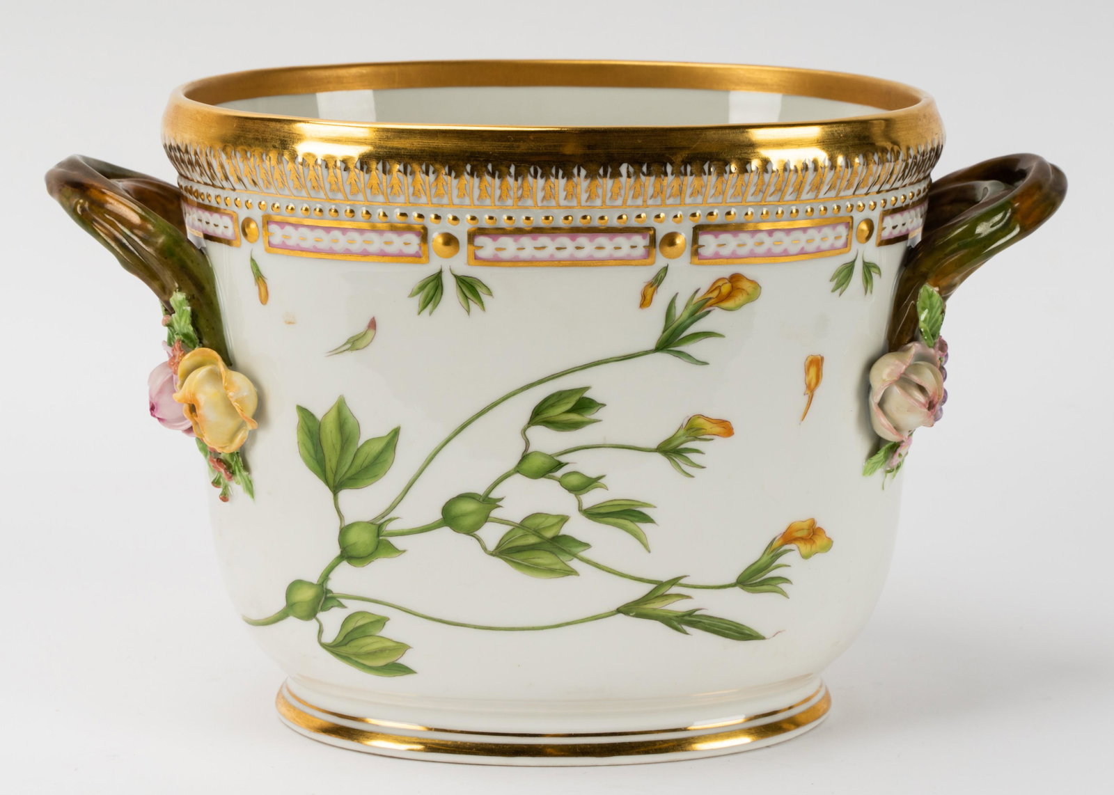 Royal Copenhagen Porcelain "Flora Danica" Oval Wine Cooler: blue wave and green crown marks; shape number 3569, pattern number 20, botanical specimen identified in Latin; flanked by branch-form handles with floral terminals 6 1/2 x 10 1/2 x 6 1/4 in. (16.5 x 2