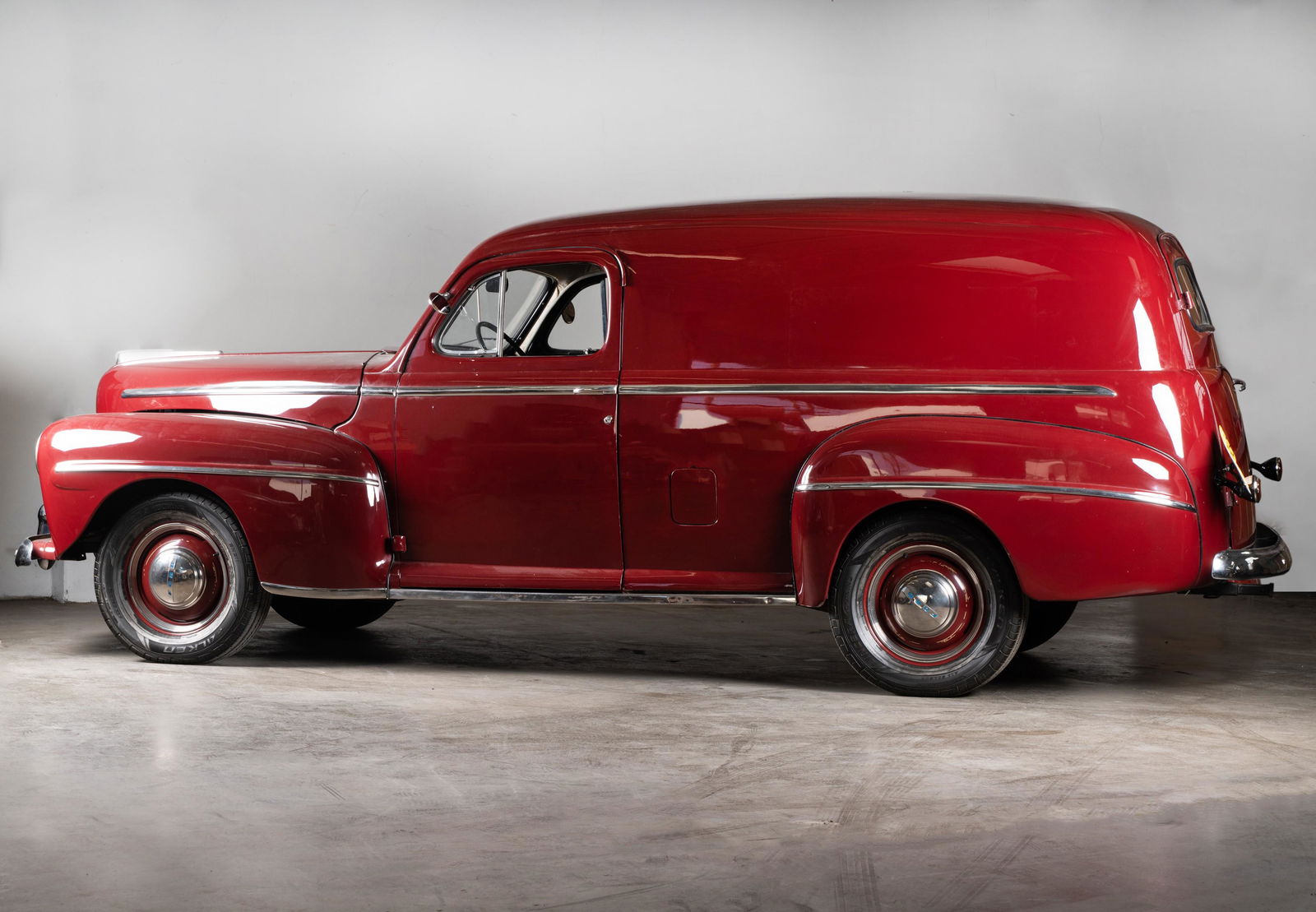 1947 Ford Sedan Delivery V8: VIN:71GA359974 Odometer: 46413 Color: Burgundy Interior: Grey Engine: 239 CID Flathead V8 Transmission: 3-speed manual ORIGINALLY USED AT WRIGHT- PATTERSON AIR FORCE BASE, OHIO. •This one has bee