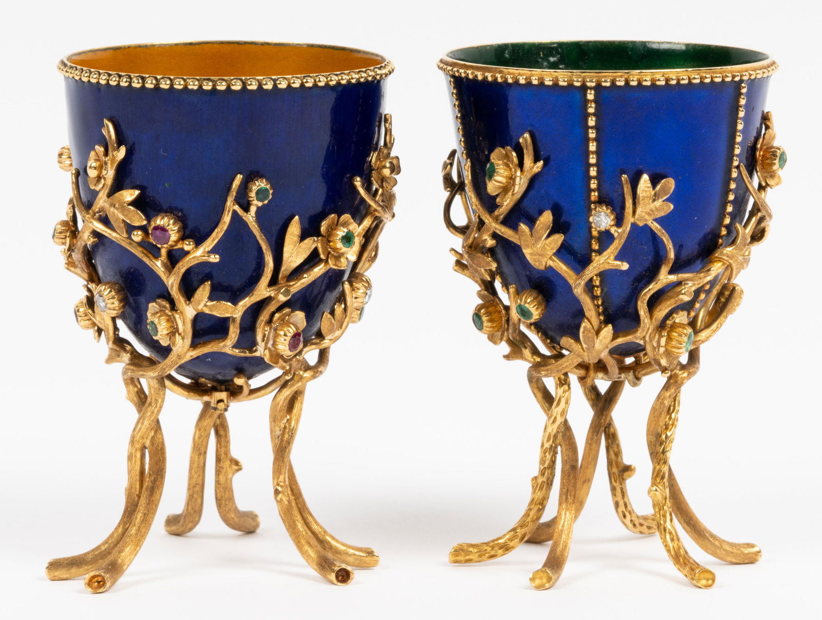 18 Karat Yellow Gold Enamel Diamond And Gem-Set Egg Cups: Including an 18 Karat yellow gold cup set with three single cut round Diamonds [I/I-1], approximate total diamond weight 0.09 carat, and nine round mixed cut Emeralds, approximate total emerald weight