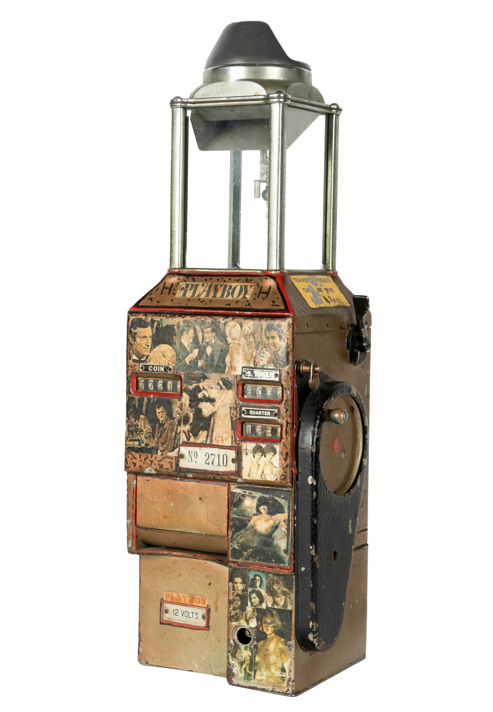 Hugh Hefner - Vintage Coin-Operated Bus Fare Machine: metal and glass, later decorated with Playboy-related images; marked "No. 2710" and "12 volts"; from the game room at the Playboy Mansion 25 1/2 x 9 1/2 x 7 1/2 in. (64.8 x 24.1 x 19.1 cm.) Provenance