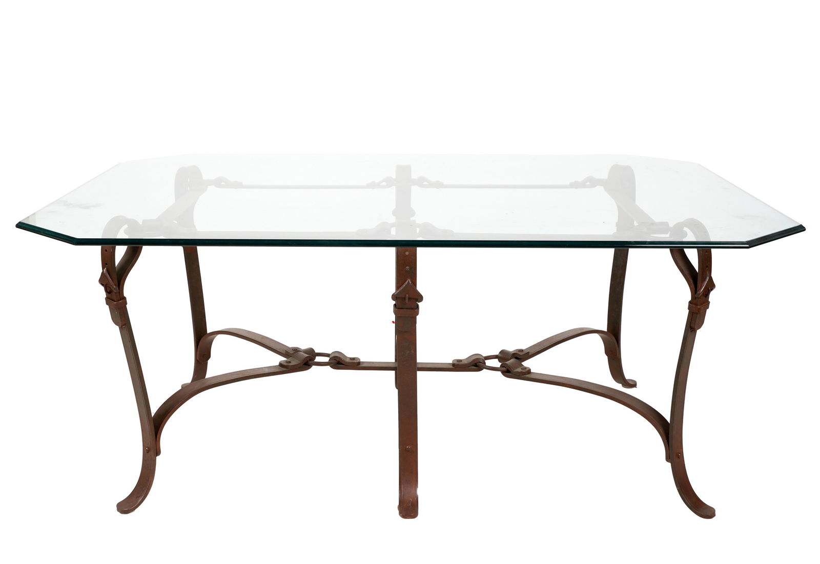 Connie Stevens- Iron and Glass Coffee Table: the legs cast with buckles 23 1/2 x 58 x 42 in. (59.7 x 147.3 x 106.7 cm.)
