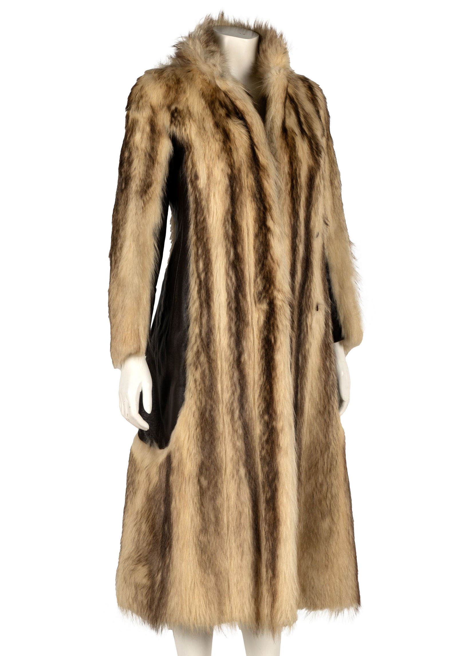 Connie Stevens- Long Fur Coat: white and brown striped fur coat, with Donald Brooks for Michael Forrest label length: 48 in. (121.9 cm.), width of shoulders: 16 in. (40.6 cm.), width of chest: 16 in. (40.6 cm.)