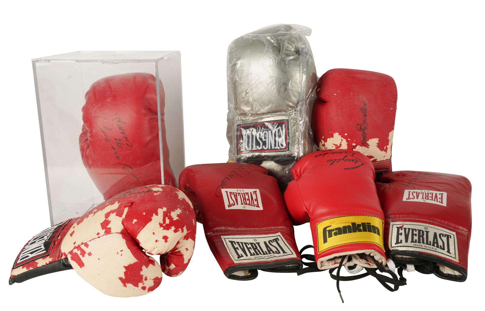 Connie Stevens- Collection of Signed Boxing Gloves: comprising two pairs, and four individual gloves, one in an acrylic case, possibly signed "Oscar de la Hoya", another signed "Angelo Dundee" the case: 11 3/4 x 7 1/4 x 7 1/2 in. (29.8 x 18.4 x 19.1 cm