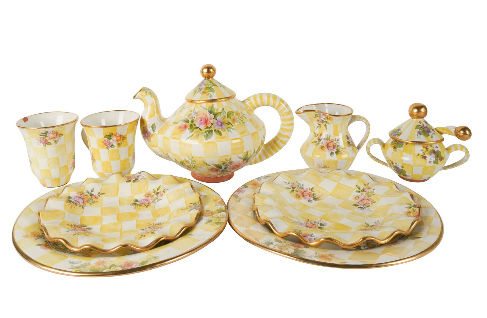 Connie Stevens- MacKenzie-Childs Glazed Terracotta Tea Service: impressed tfactory mark; comprising a teapot (8 x 11 1/2 x 8 in.), a creamer (4 3/4 x 5 1/4 x 4 1/4 in.), a sugar bowl with spoon (5 1/2 x 7 x 4 1/2 in.), two mugs (4 3/4 x 4 1/4 in. dia.), two round