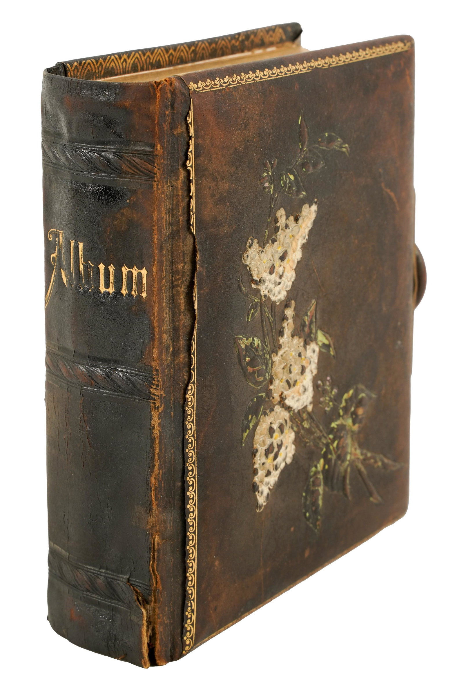 Connie Stevens- Antique Photo Album: with embossed floral motif to cover; with antique black and white photographs 6 1/2 x 5 1/2 x 2 1/4 in. (16.5 x 14 x 5.7 cm.)