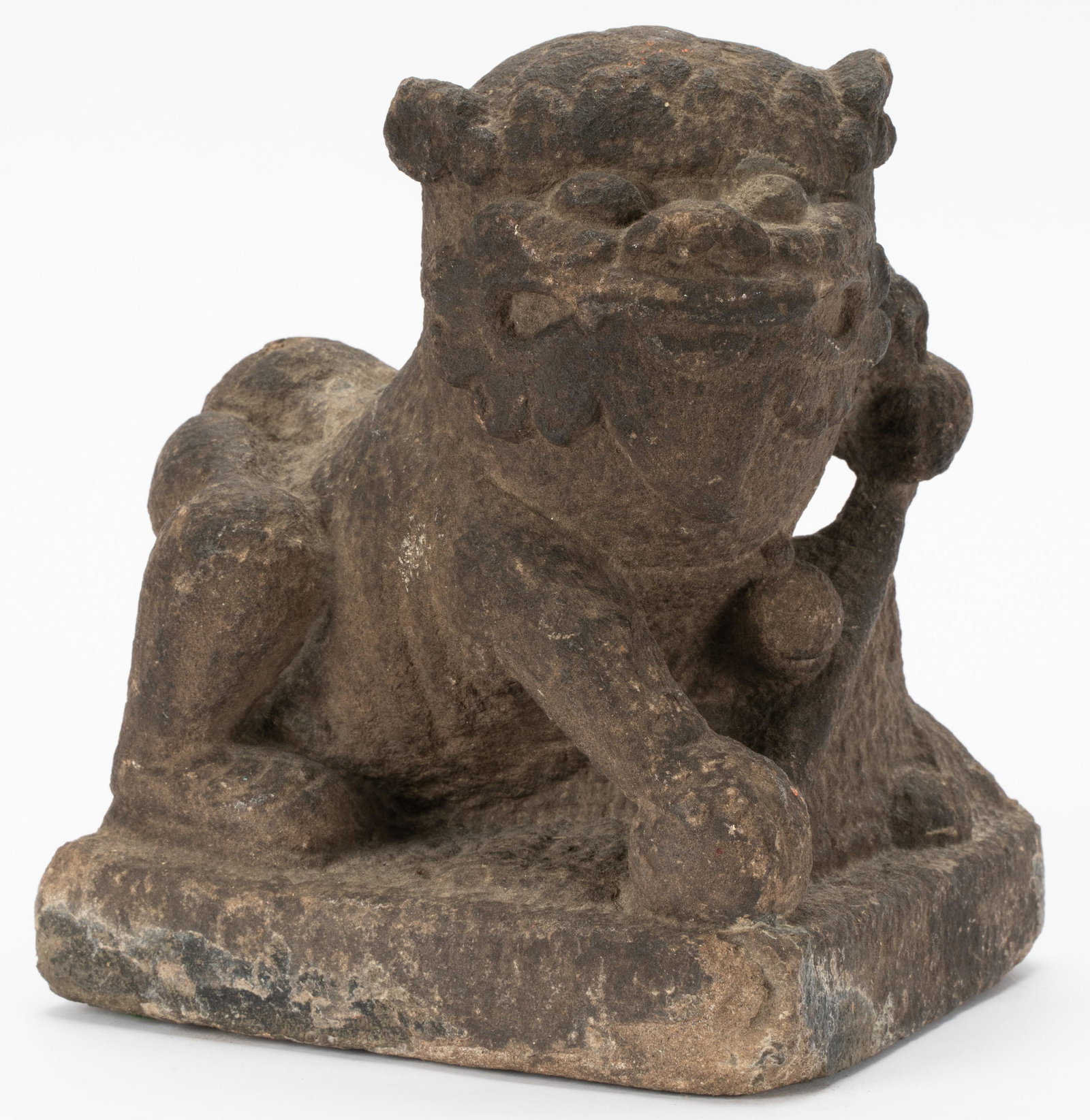 Chinese Carved Limestone Figure of a Seated Lion: Tang Dynasty 6 3/4 x 5 3/4 x 4 3/4 in. (17.1 x 14.6 x 12.1 cm.) Provenance: Property from an Estate, Wilshire Corridor, Los Angeles, California