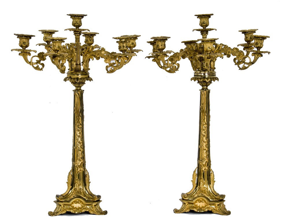 PAIR OF LOUIS XVI STYLE DORE BRONZE SEVEN-LIGHT CAN: each Neoclassical stem with scrolled candle arms and a tripod base 29 1/2 inches high
