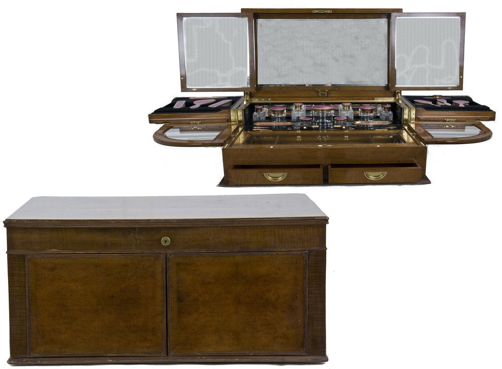 EDWARDIAN SILVER AND ENAMEL VANITY SET: William Frederick Wright, London, 1917-18 twenty-nine pieces; in a fitted case with a triptych beveled mirror and sliding trays and shelves