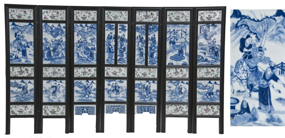 CHINESE SEVEN-PANEL PORCELAIN SCREEN: each frame with famille rose and blue and white porcelain tiles each panel measuring 27 1/2 inches high