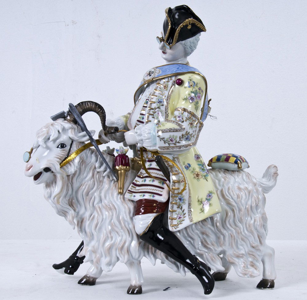 MEISSEN STYLE PORCELAIN TAILOR ASTRIDE A GOAT: possibly Samson, with cross sword marks underglaze 16 inches high