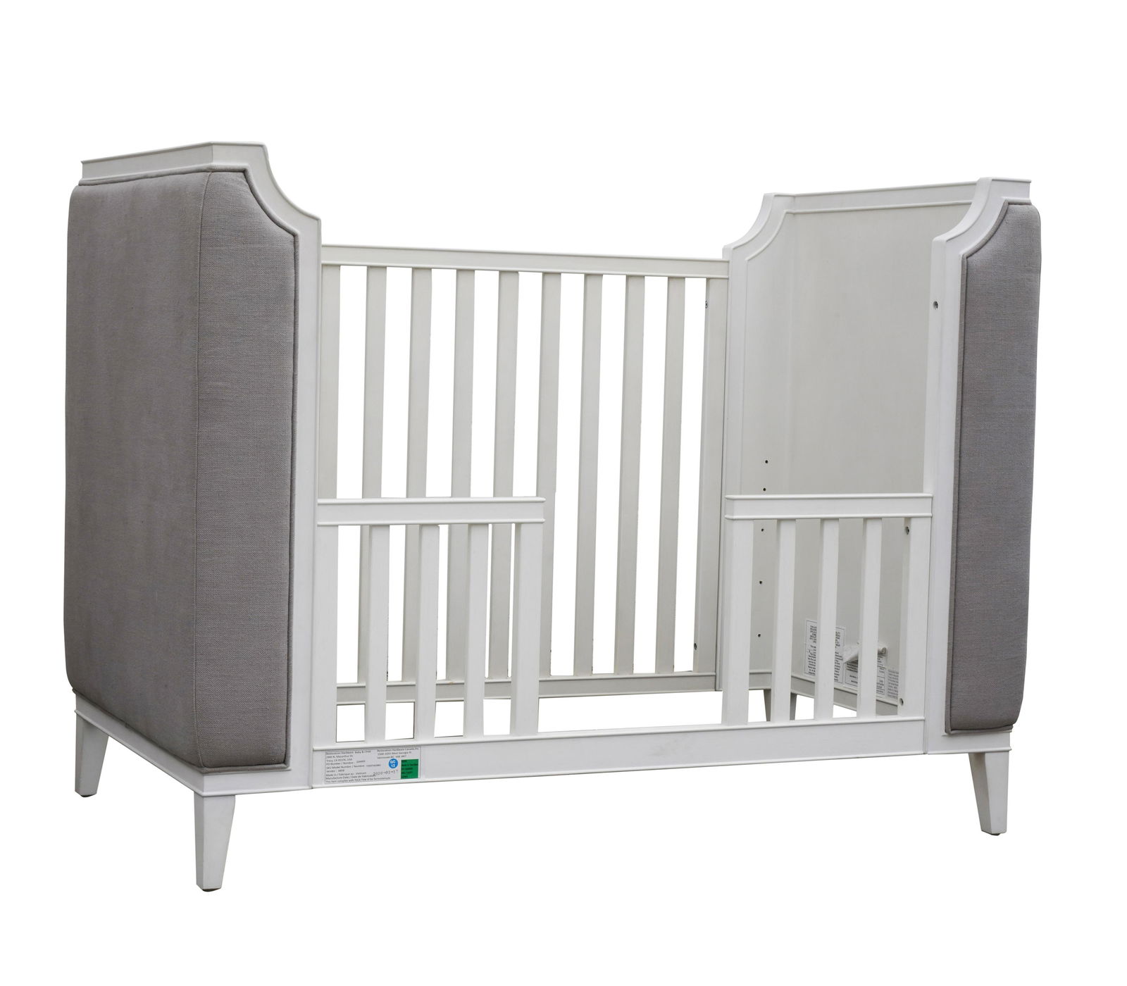 Restoration Hardware White-Painted Crib: with manufacturer's label; upholstered in grey linen fabric 43 1/4 x 57 1/2 x 32 in. (109.9 x 146.1 x 81.3 cm.)
