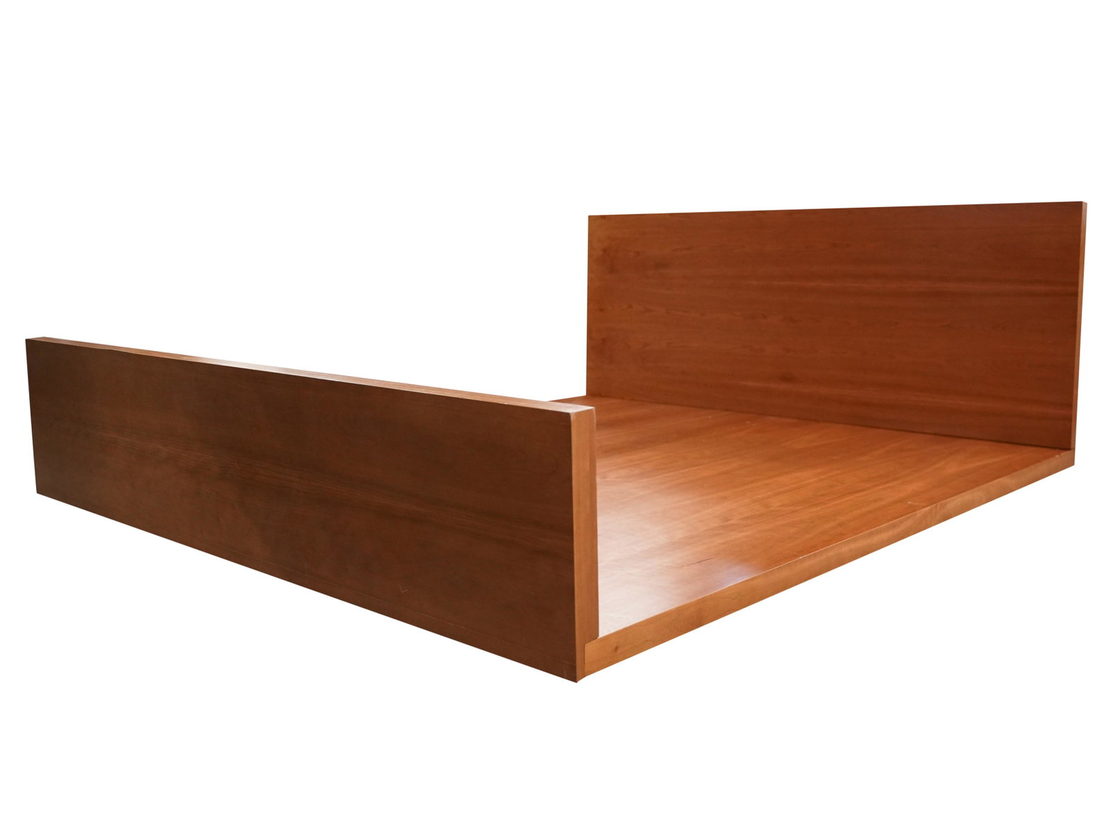 Modernist California King-Size Bed: stained wood veneer; unsigned; constructed in four parts Approximately 33 1/2 x 88 1/4 x 74 in. (85.1 x 224.2 x 188 cm.), Inner frame: 85 x 74 in. (215.9 x 188 cm.)