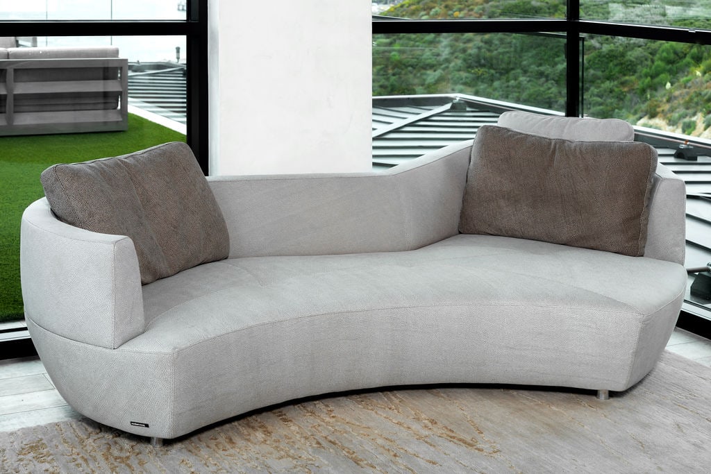 Gabriele Assmann and Alfred Kleene for Roche Bobois: Digital Sofa: covered with textured fabric; with manufacturer's label 24 x 100 x 55 in. (61 x 254 x 139.7 cm.), Seat height: 14 in. (35.6 cm.) Provenance: Property from a Private Residence, Carbon Beach, Malibu, Ca