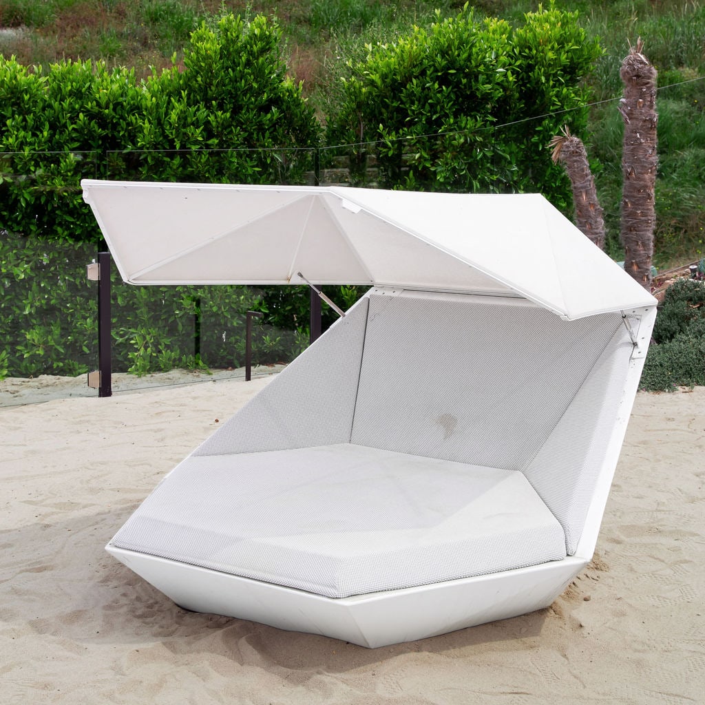 Covered Outdoor Lounge / Daybed: manufacturer unknown; with hinged canvas top forming a cover Approximately: 72 x 52 x 58 in. (182.9 x 132.1 x 147.3 cm.), Seat height: 16 in. (40.6 cm.) Provenance: Property from a Private Residence, 