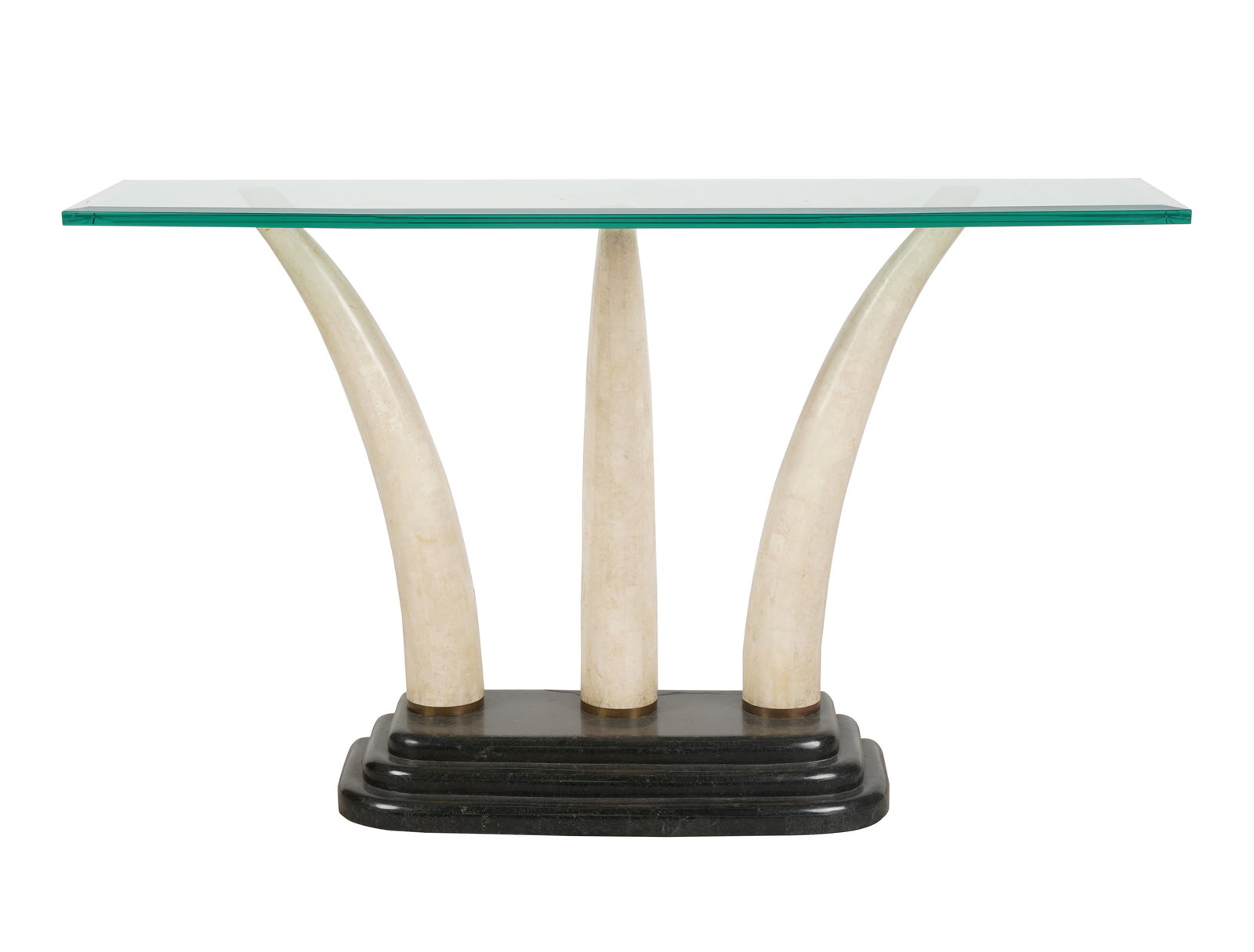 Maitland-Smith Console Table: fossilized coral and glass; unsigned; the removable top on three tusk-form supports 29 x 48 x 14 in. (73.7 x 121.9 x 35.6 cm.) Provenance: Property from the personal collection of Jeff Schuerholz of F