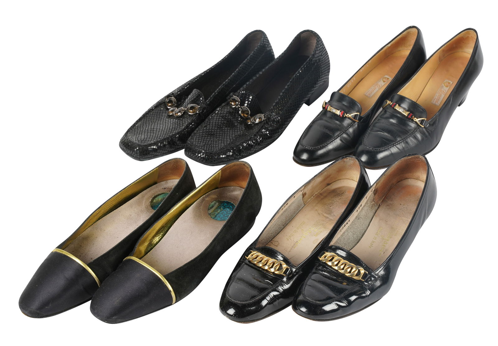 Group of Designer Shoes: comprising a pair of Gucci heeled loafers (Size 37); a pair of Prada flats with gold detail (Size 37); a pair of Stuart Weitzman loafers (unsized, probably size 37); and a pair of Salvatore Ferragamo