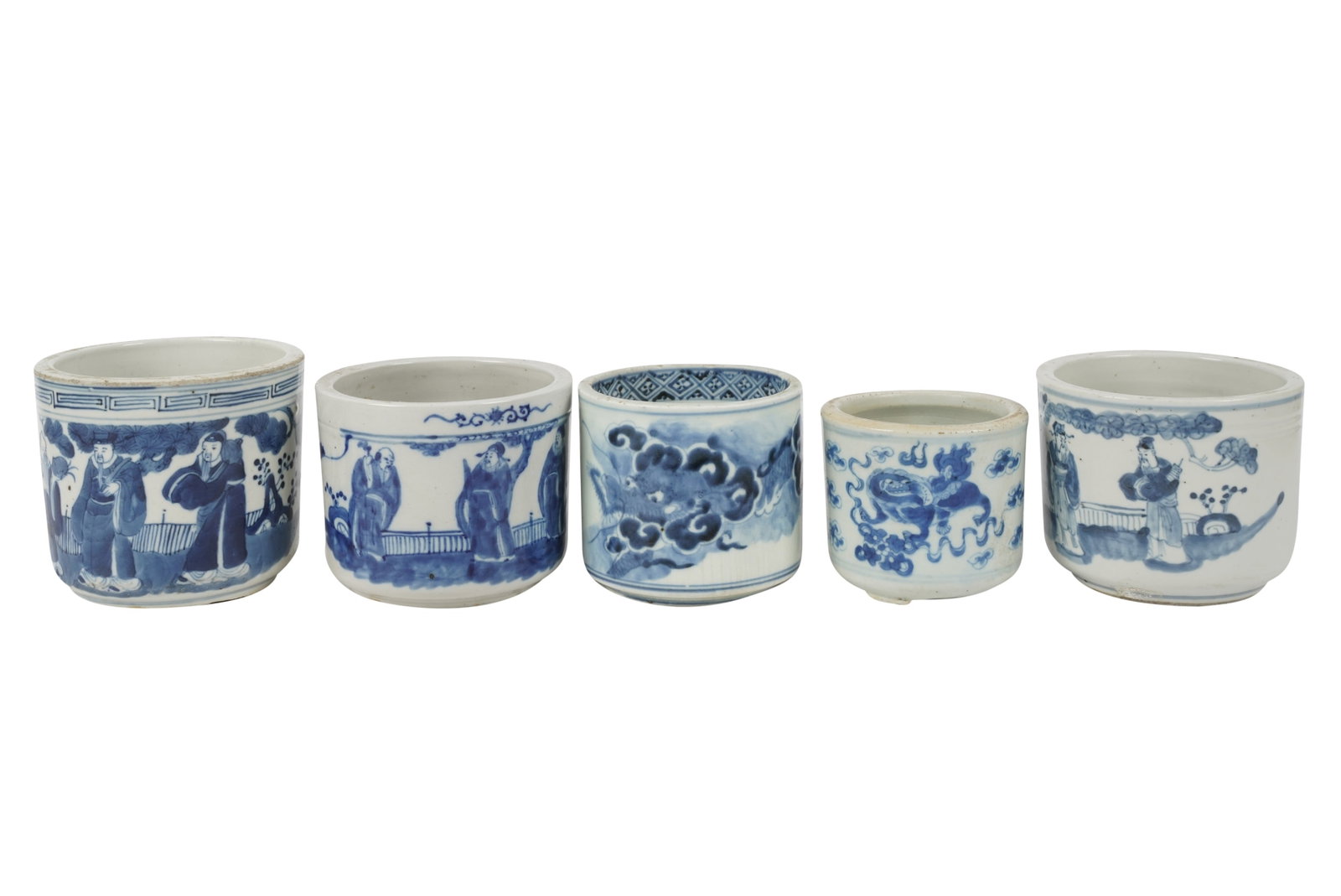 Collection of Blue and white Porcelain Brush Pots: one with wax seal to underside Ranging from 3 1/2 x 4 in. (8.9 x 10.2 cm.), to 4 1/2 x 5 1/8 in. (11.4 x 13 cm.)