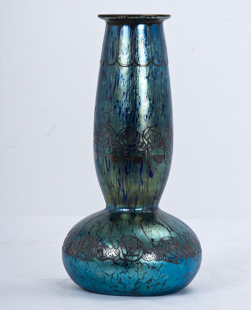 LOETZ SILVER OVERLAY ART GLASS VASE: the striated blue body with silver design 10 1/2 inches high
