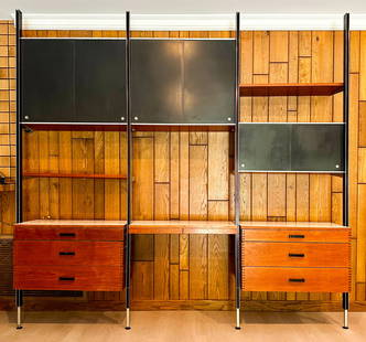 George Nelson (1908-1986): Three-Bay Comprehensive Storage System (CSS): Herman Miller, Zeeland, Michigan; comprising two matching three-drawer units in walnut; a double-drawer writing desk unit; three two-panel black laminate cabinets, each with interior walnut shelf; and