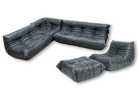 Michel Ducaroy: Togo Sectional Sofa: manufactured by Ligne Roset; charcoal grey leather, foam; comprising two side sections (27 x 52 x 29 in. and 27 x 66 x 29 in.), one corner section (27 x 36 x 29 in.), and one chair (27 x 34 x 29 in.)