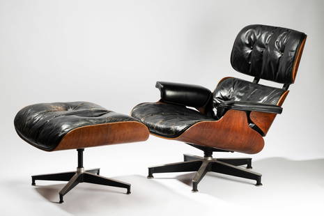 Charles and Ray Eames: 670 Lounge Chair and 671 Ottoman: manufactured by Herman Miller, c. 1980; rosewood plywood, black leather, aluminum and enameled steel; unsigned Chair: 32 1/2 x 33 1/4 x 34 in. (82.6 x 84.5 x 86.4 cm.), Seat height: 15 in. (38.1 cm.);