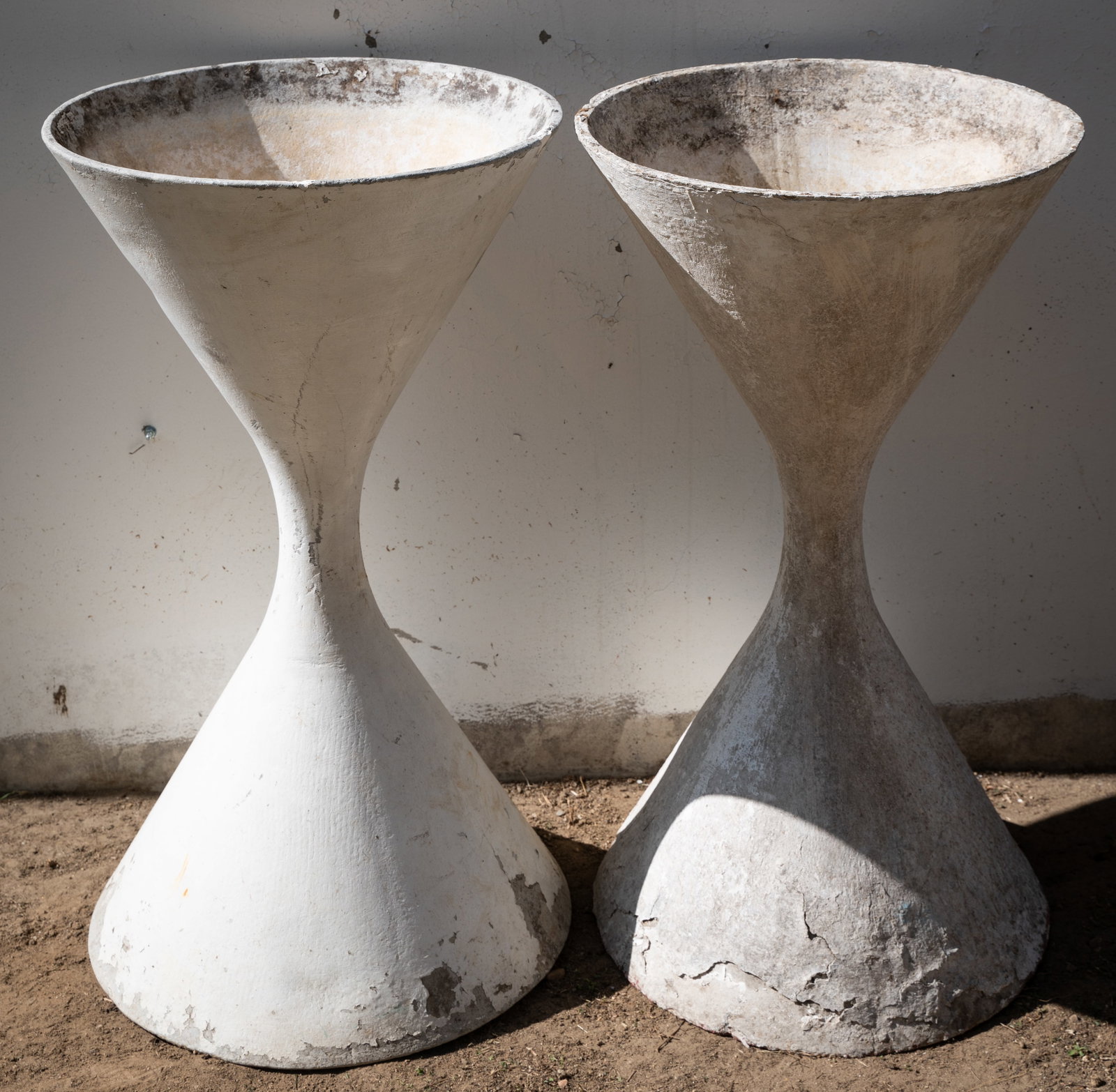 Willy Guhl (1915-2004): Pair of Diabolo Planters: manufactured by Eternit, Switzerland; fiber-reinforced concrete 37 3/4 x 22 in. (95.9 x 55.9 cm.)